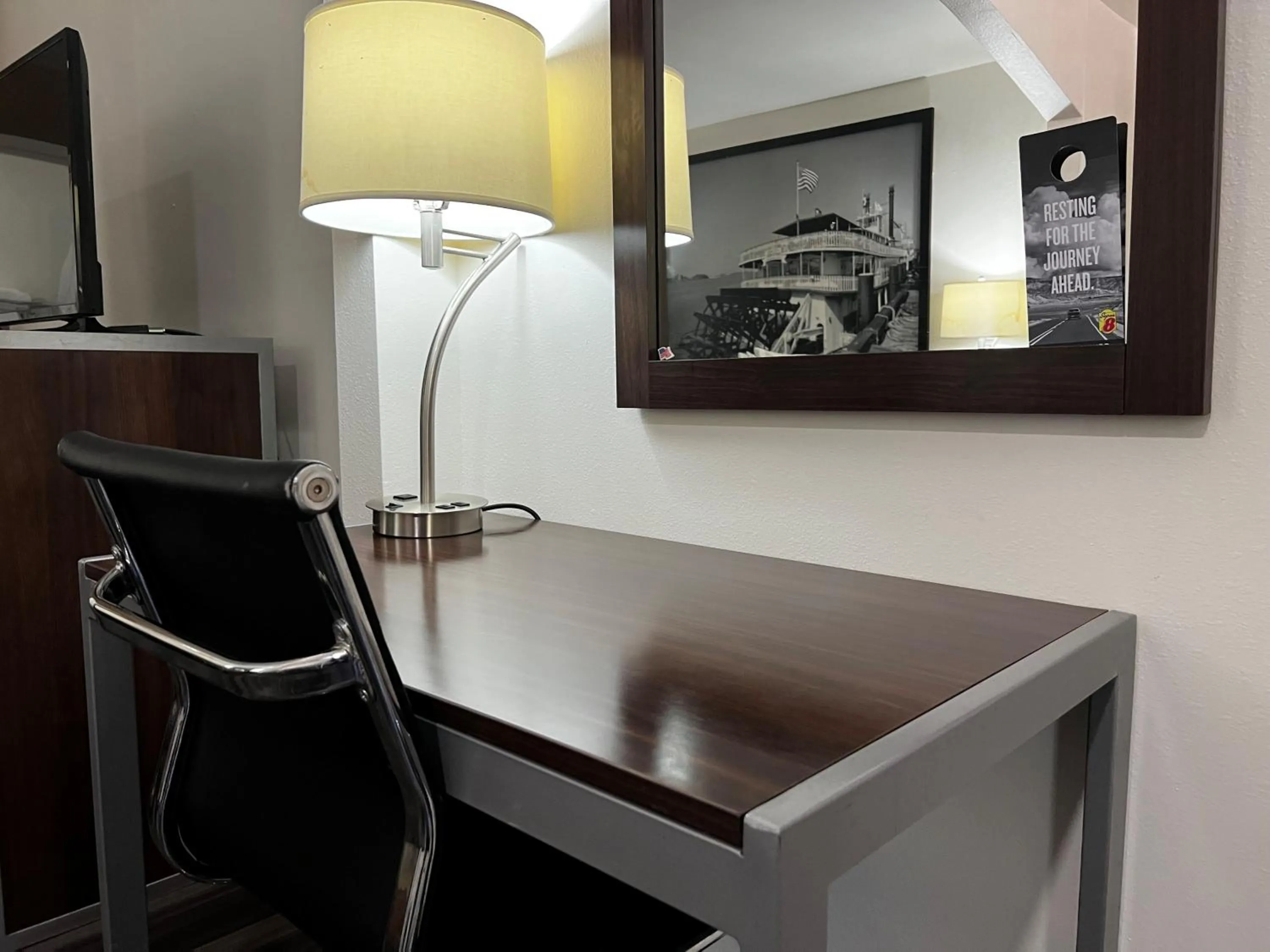 Seating area in Super 8 by Wyndham Slidell