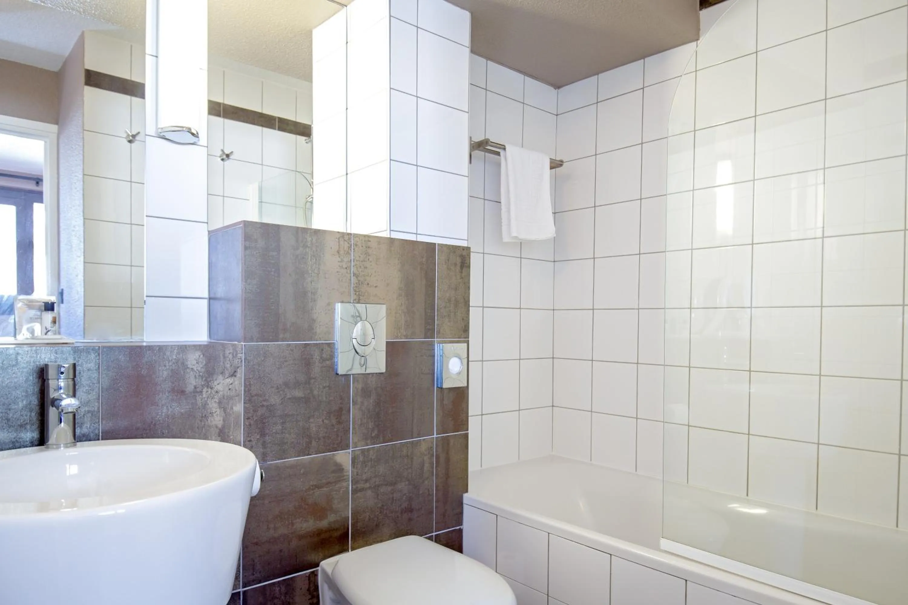 Bathroom in SOWELL HOTELS Le Pas du Loup