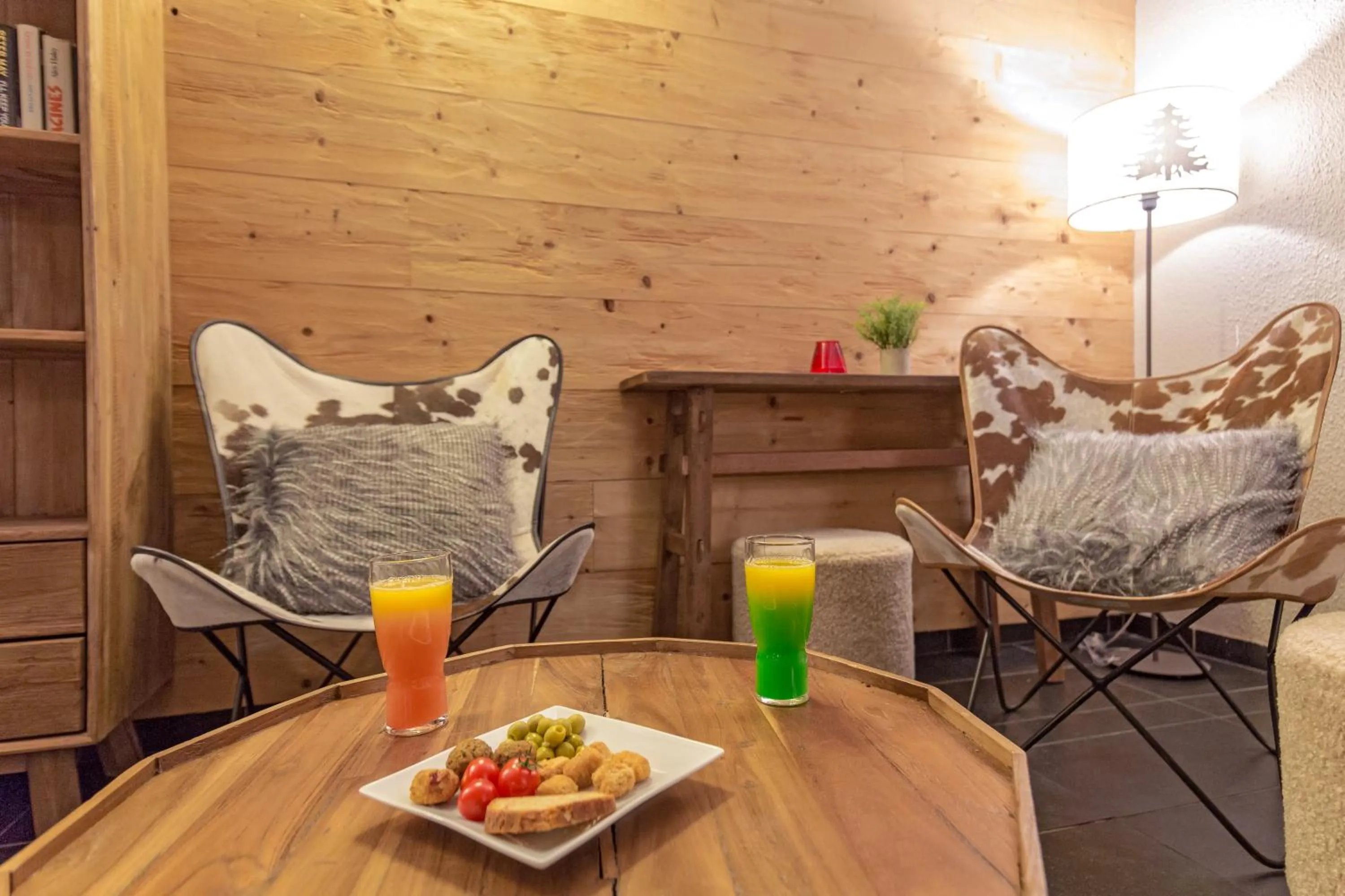 Lounge or bar in SOWELL HOTELS Le Pas du Loup