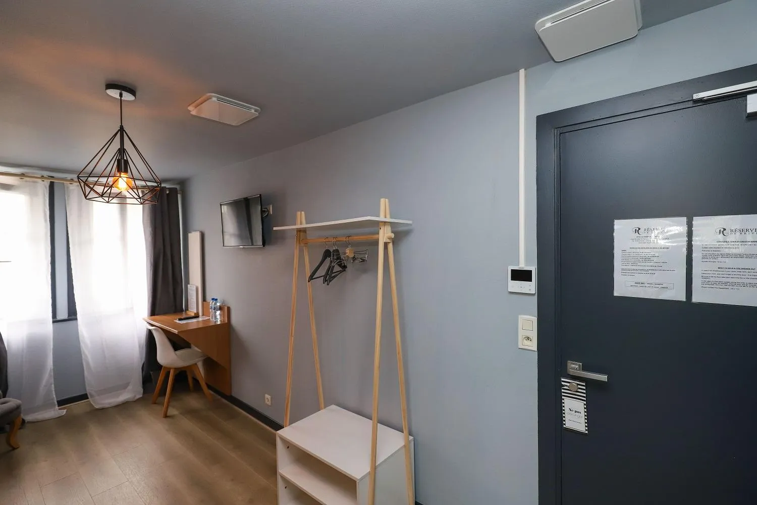 Bedroom in Hôtel La Réserve de Brive
