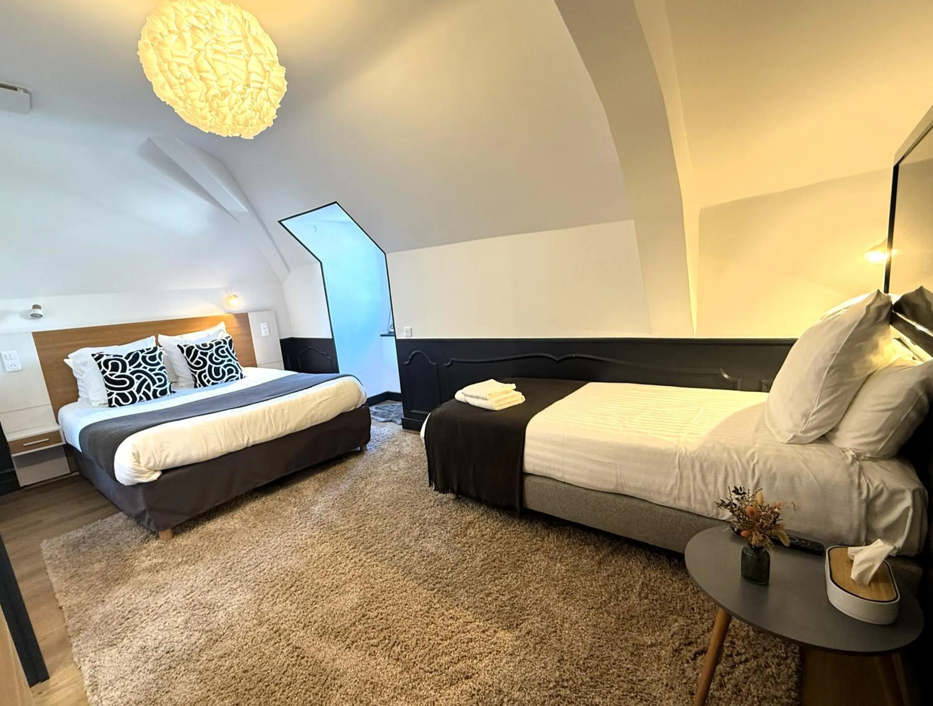 Bed in Hôtel La Réserve de Brive