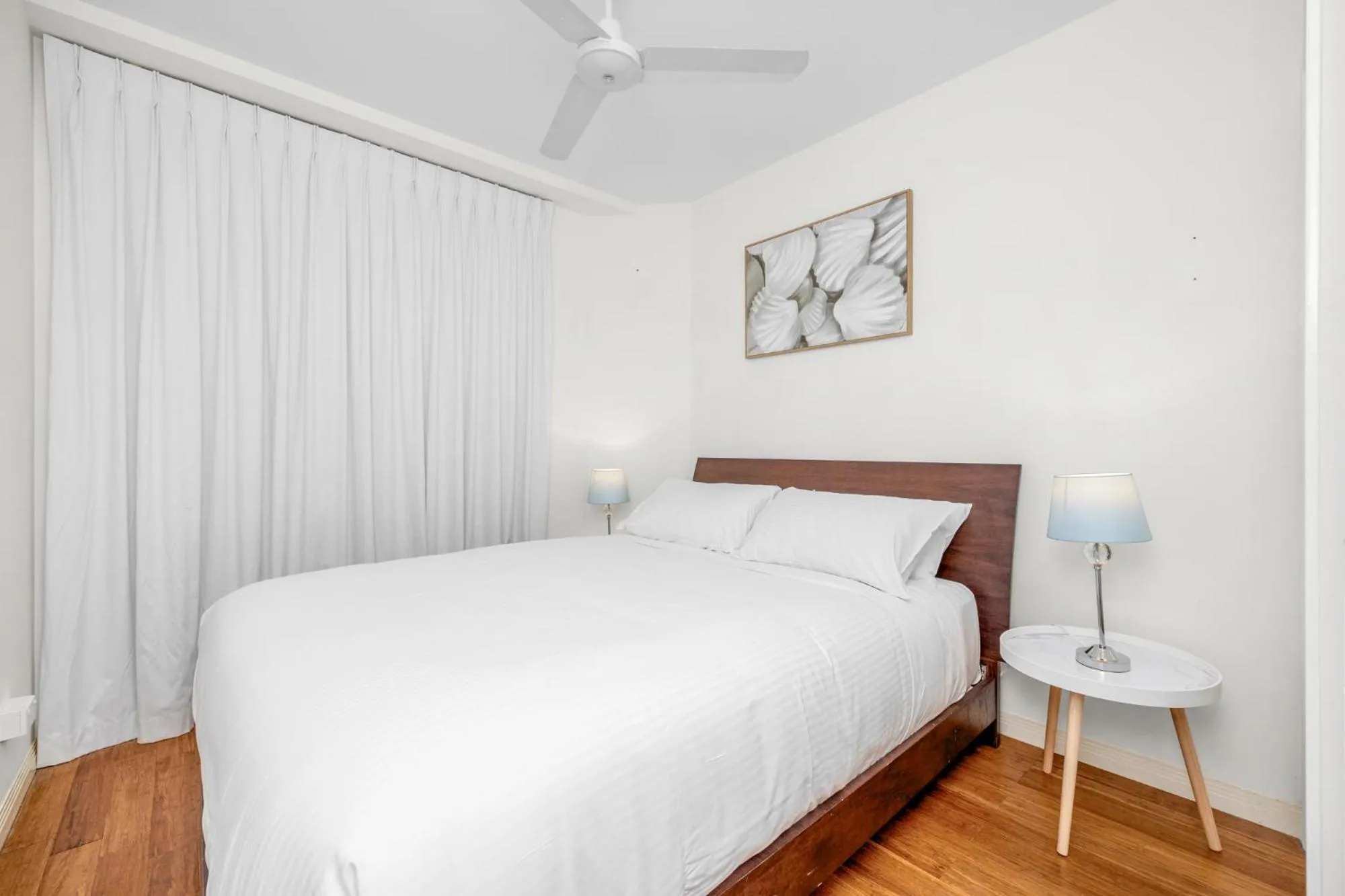 Bed in Tingeera Beachfront Apartments