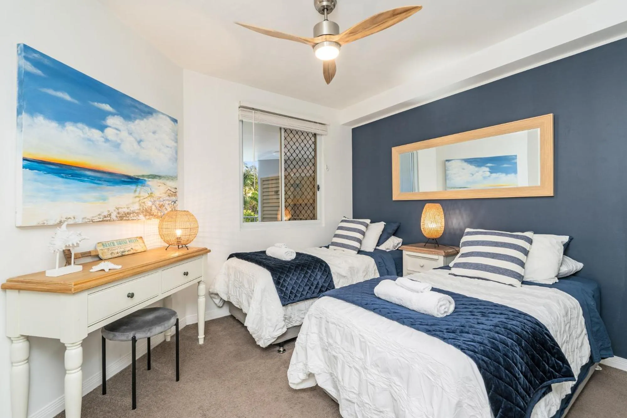 Bed in Tingeera Beachfront Apartments