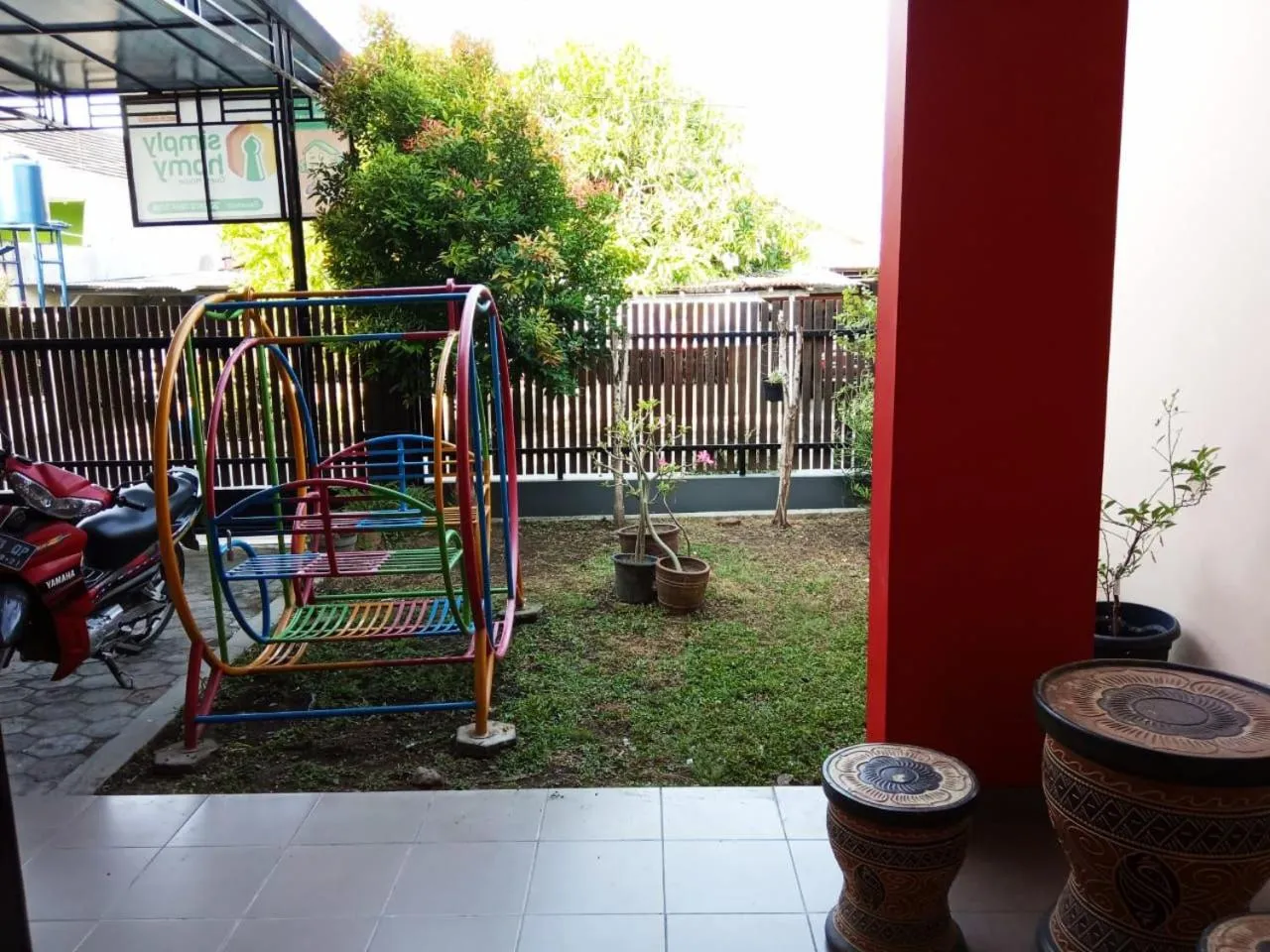 Children play ground in Homestay Tegal Kota by Simply Homy