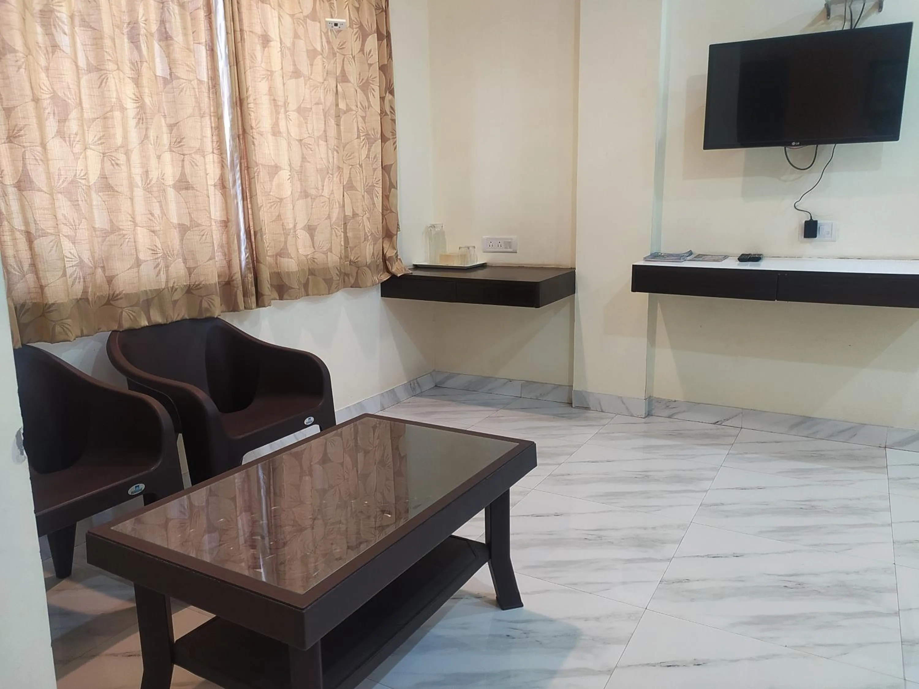 Bedroom in Sea Winds Hotel, Guhagar