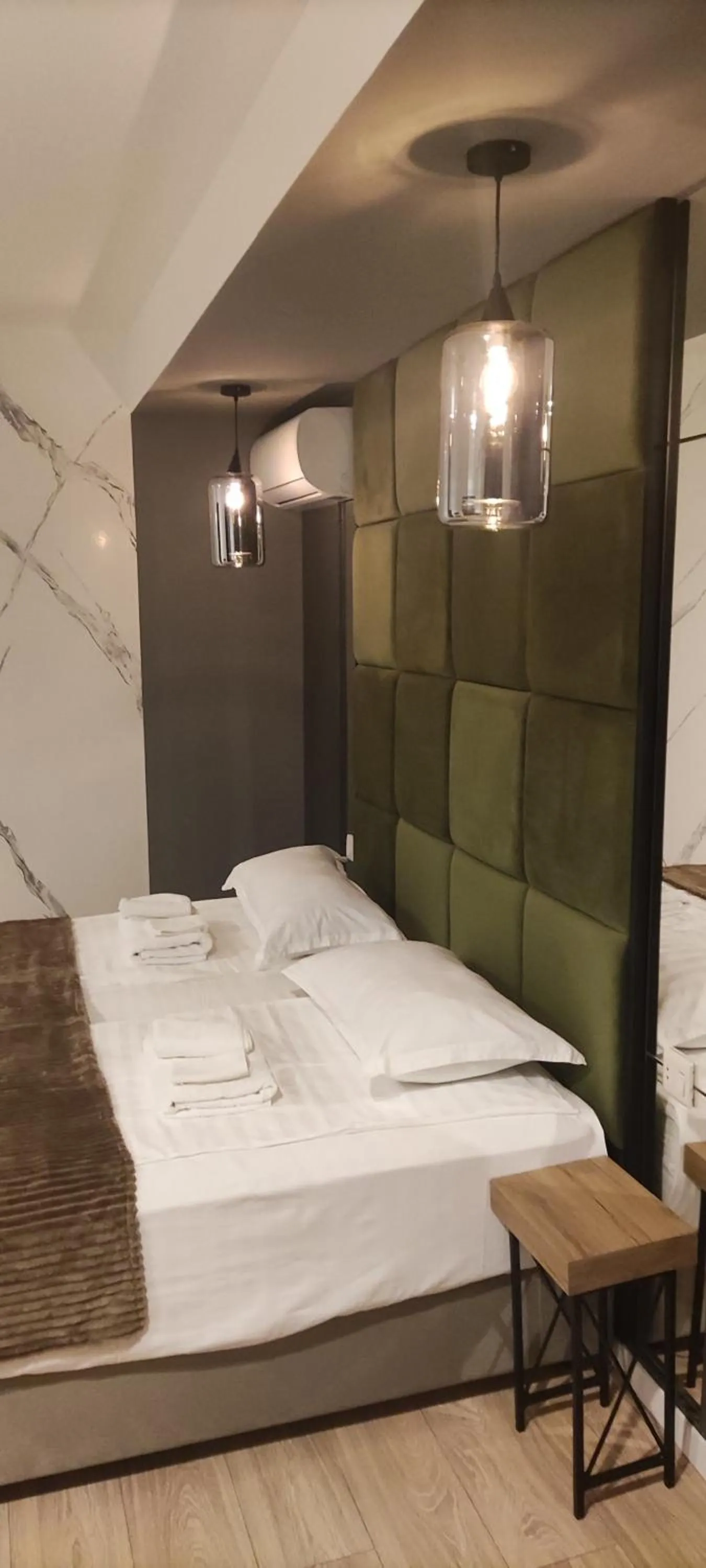 Bed in Garden Lounge Hotel