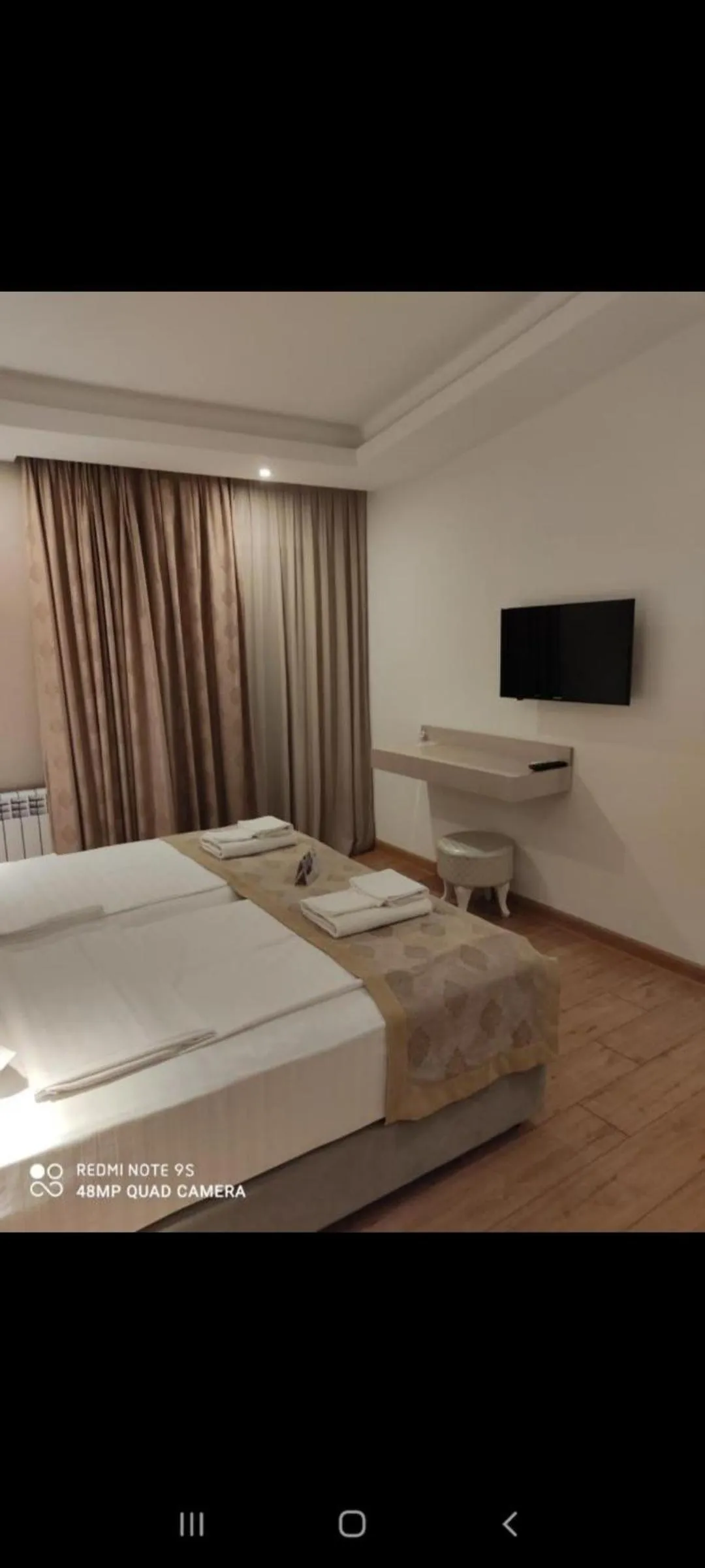 Bed in Garden Lounge Hotel