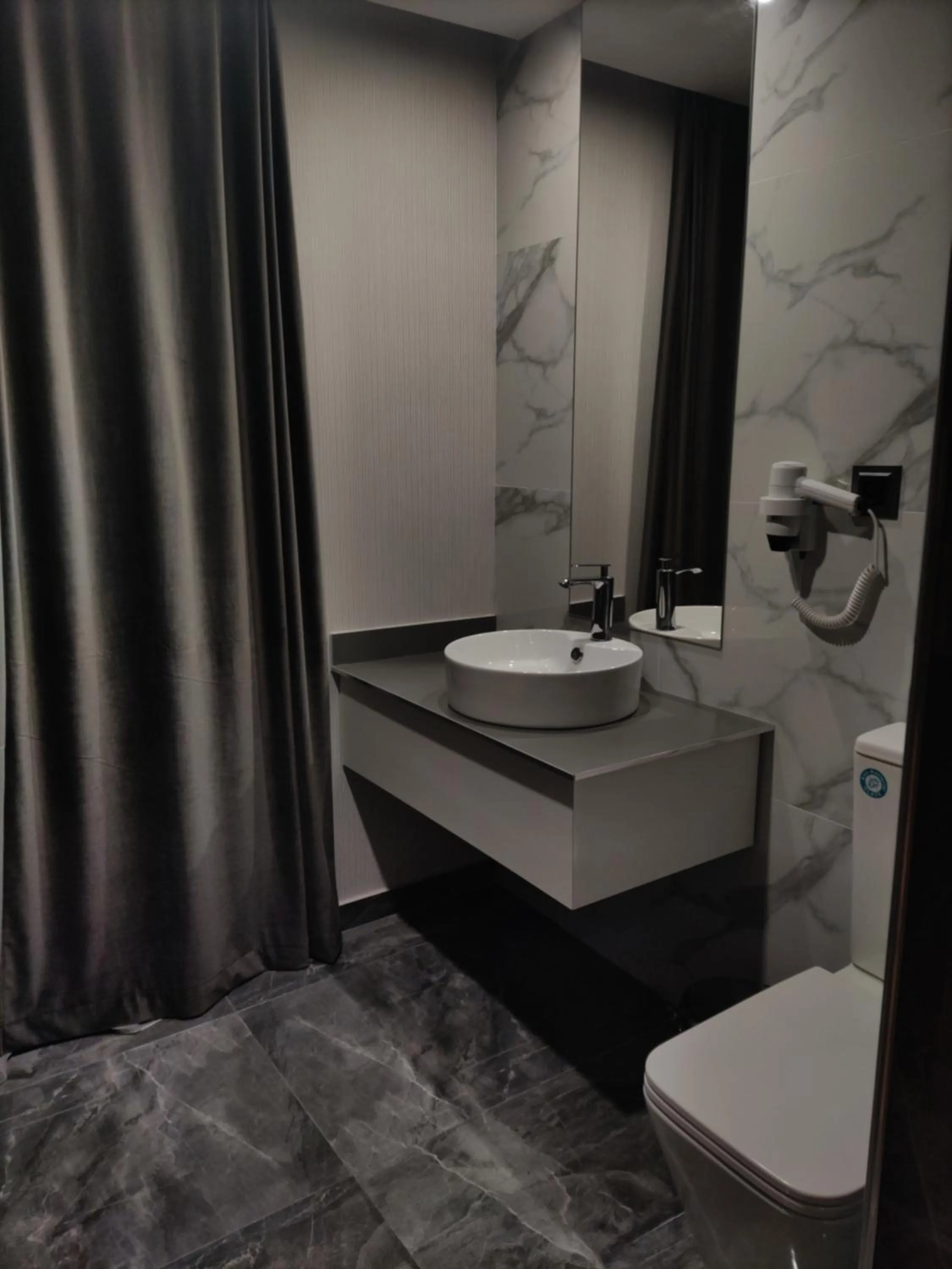 Bathroom in Garden Lounge Hotel