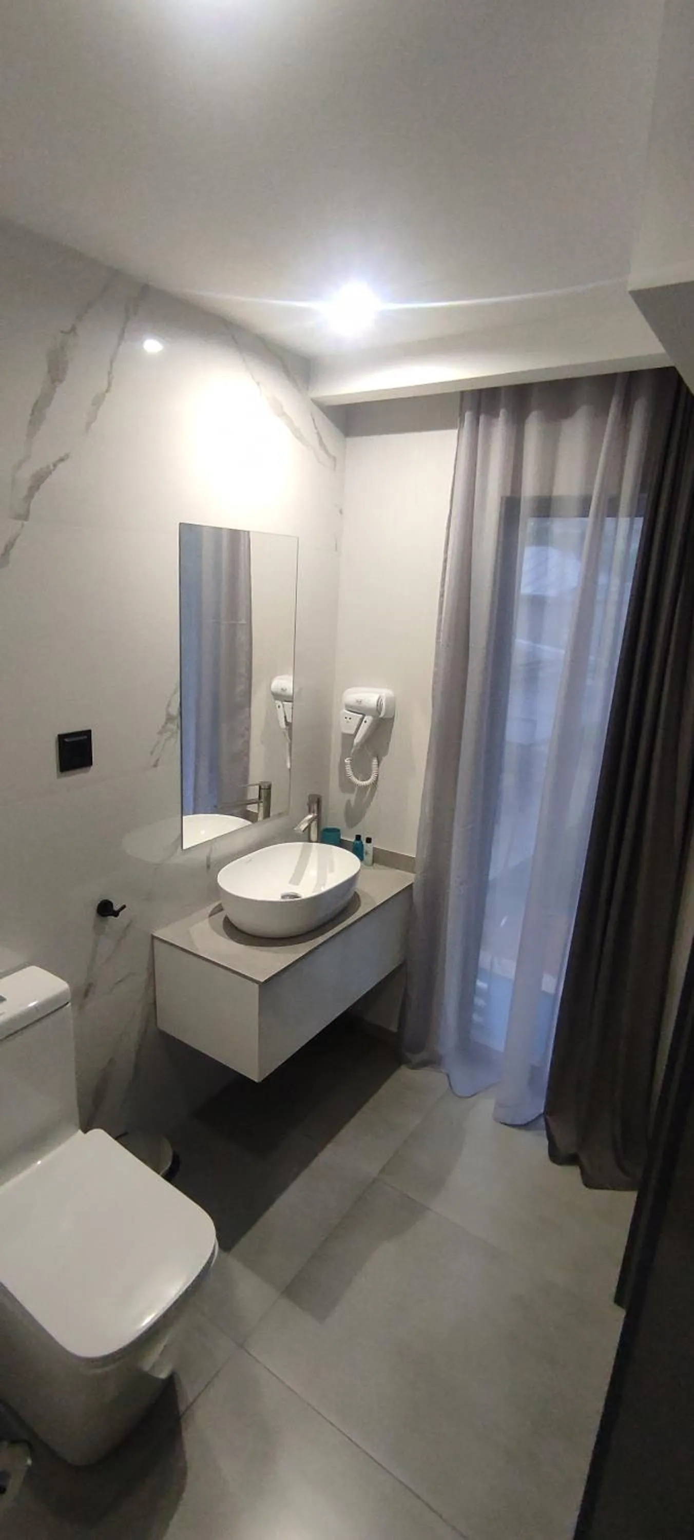 Toilet in Garden Lounge Hotel