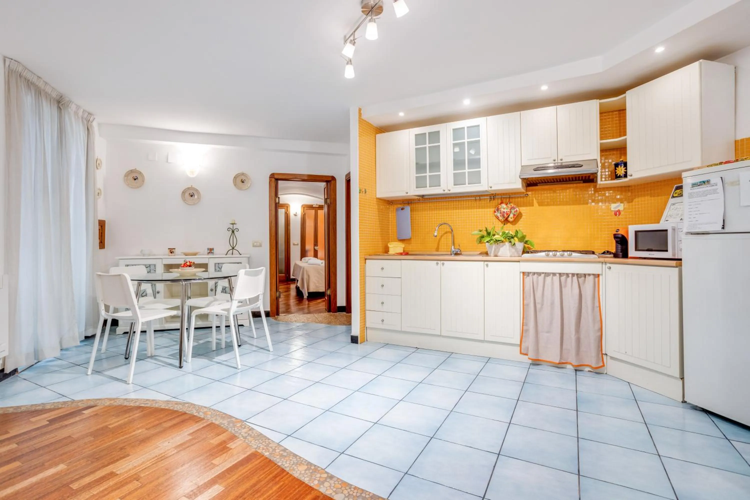 Kitchen or kitchenette in GuestHost - Casa Querida Central & Elegant Flat