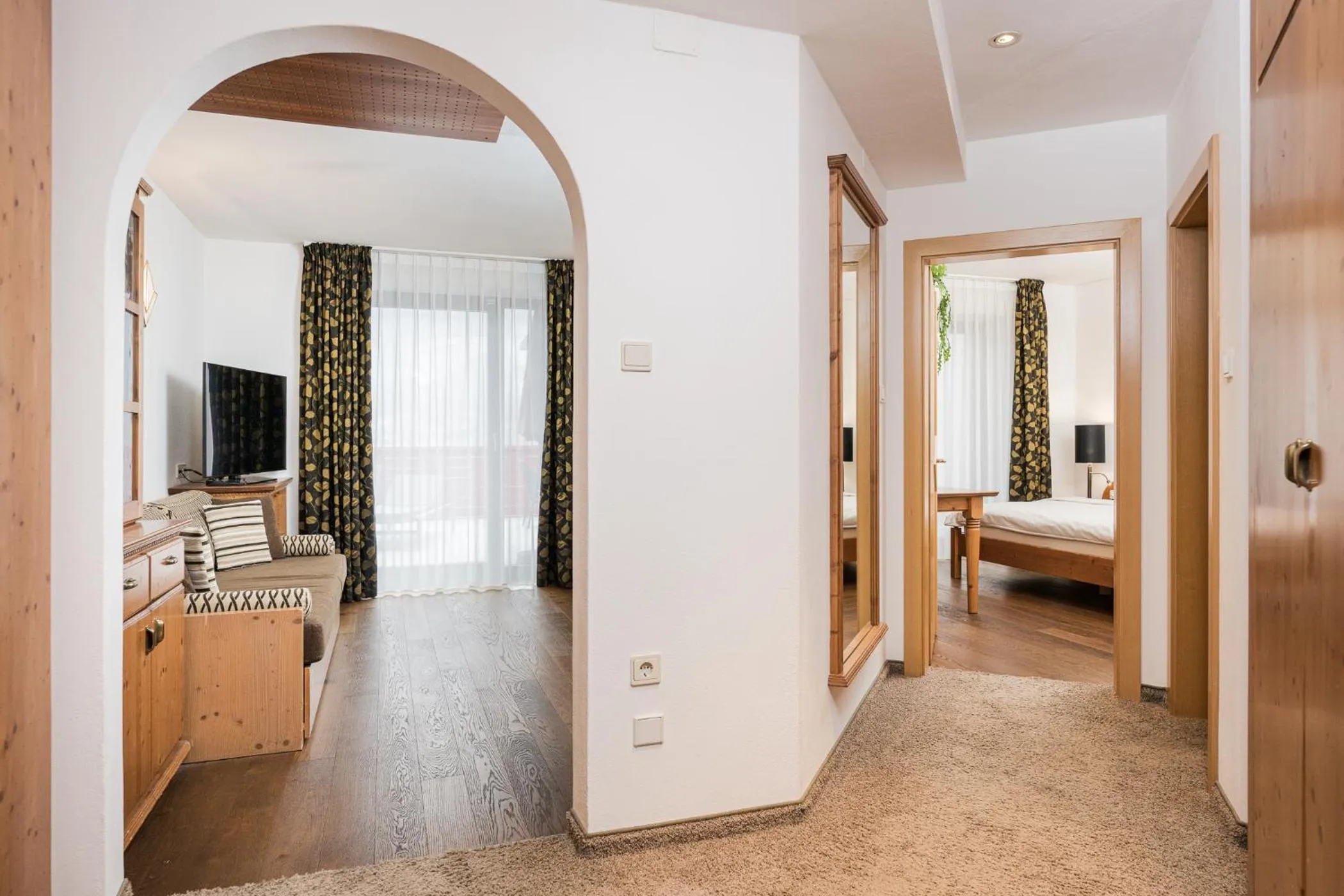 Living room, Bed in Lindenhof Pure Luxury & Spa DolceVita Resort