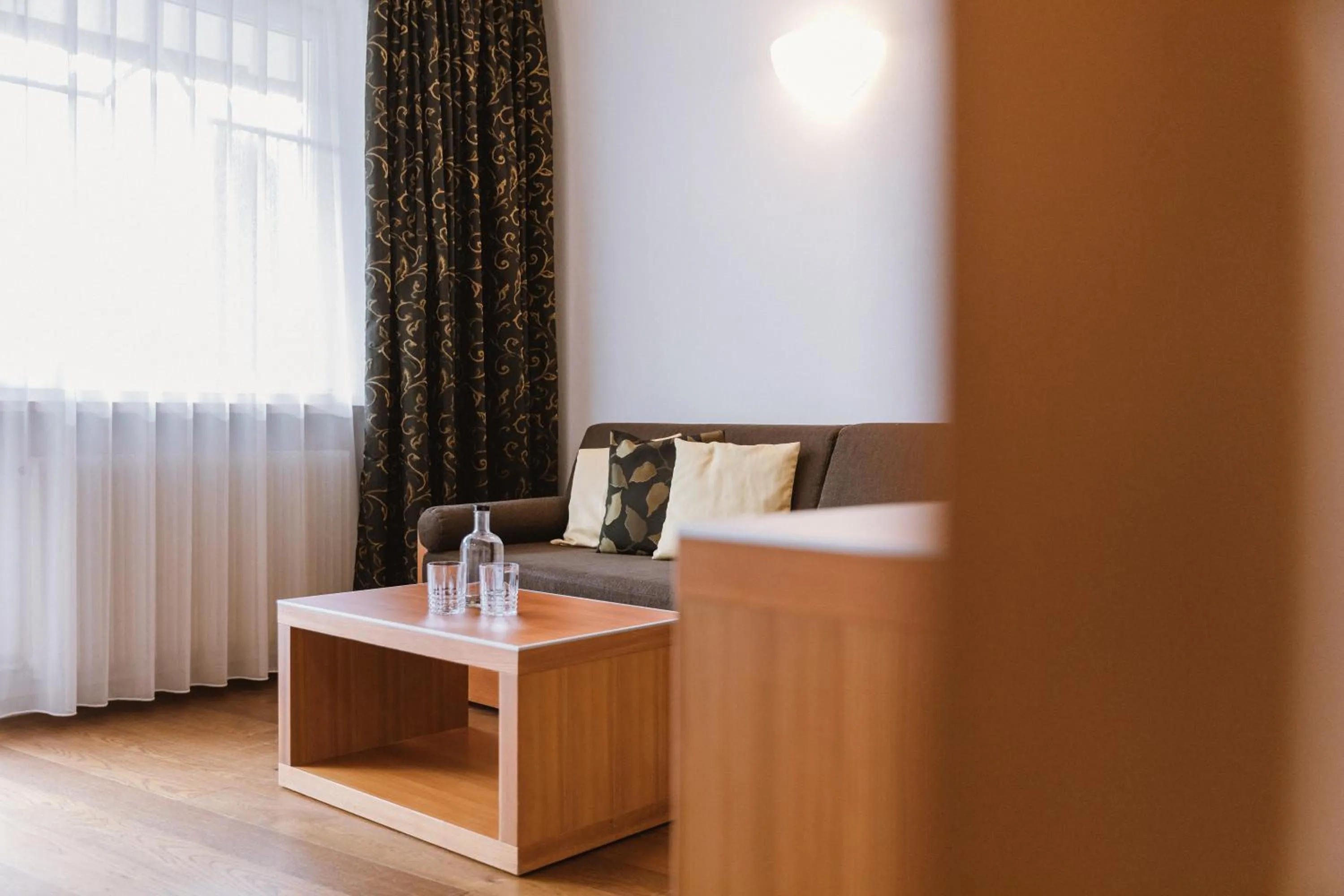 Living room, Bed in Lindenhof Pure Luxury & Spa DolceVita Resort