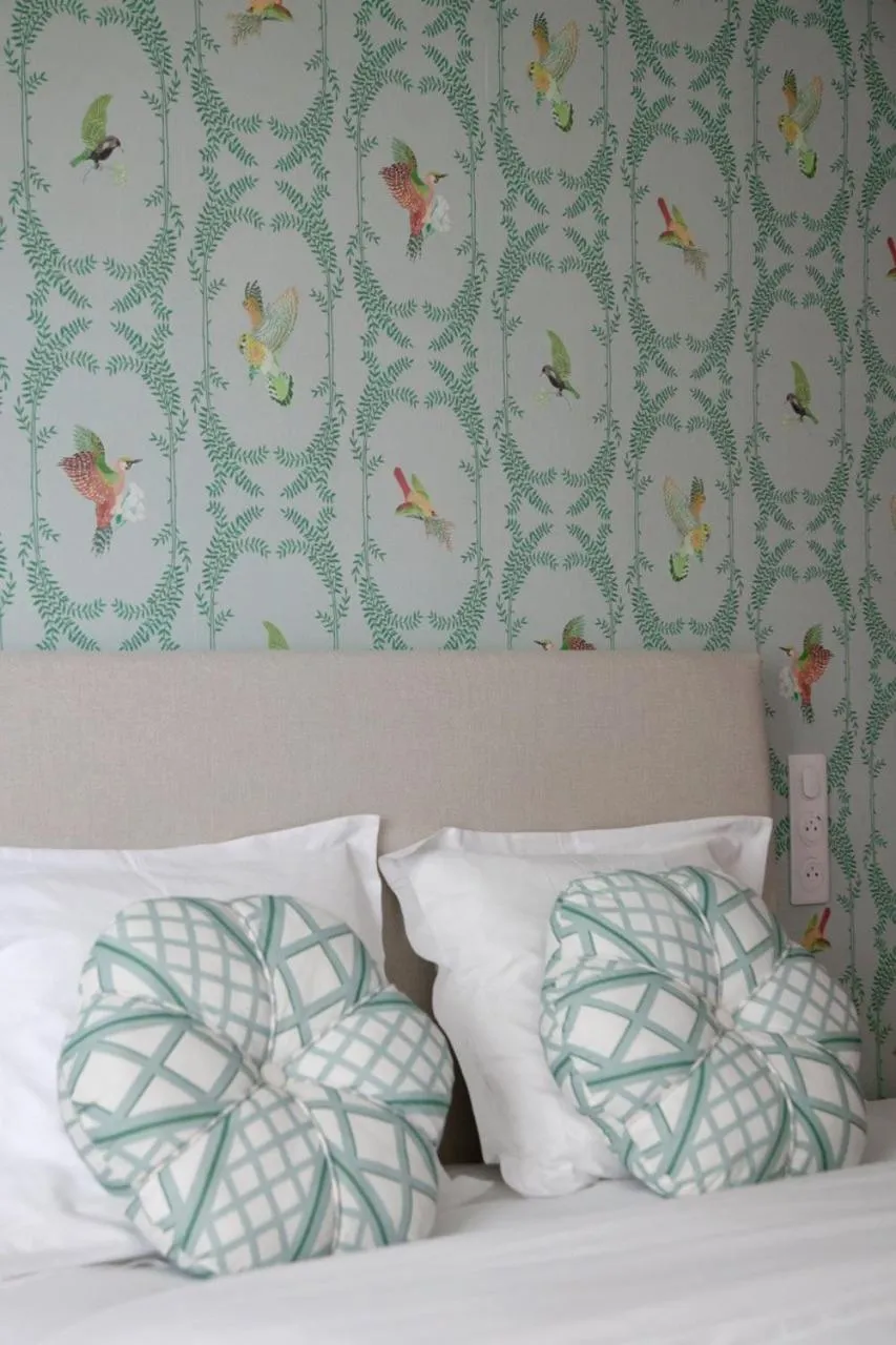 Decorative detail, Bed in Logis Hôtel Marguerite