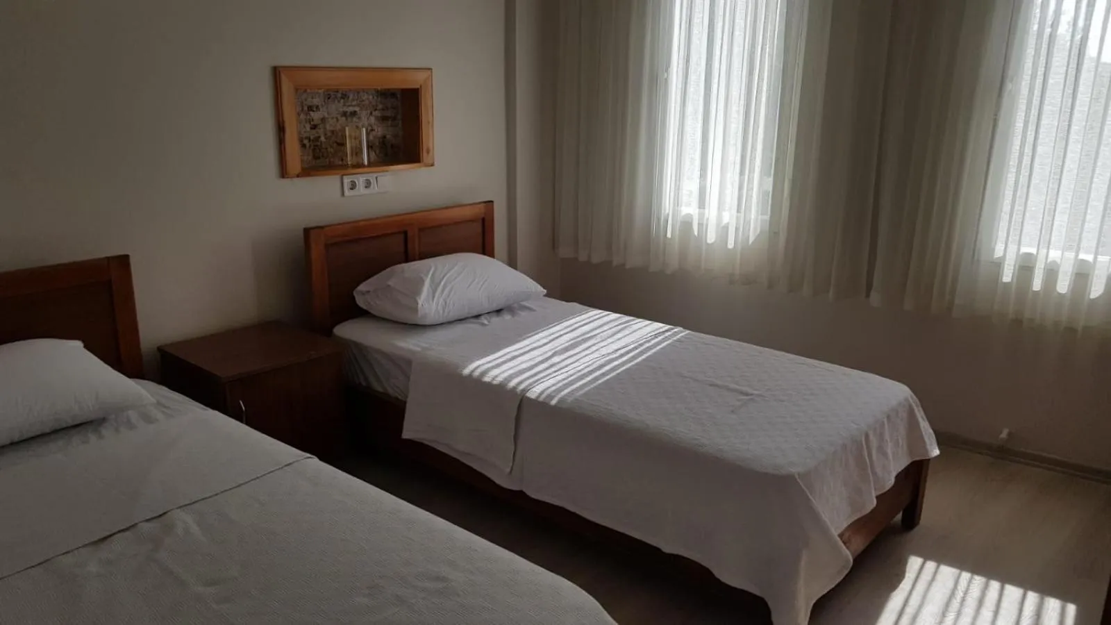 Bed in Queen Bee Hotel