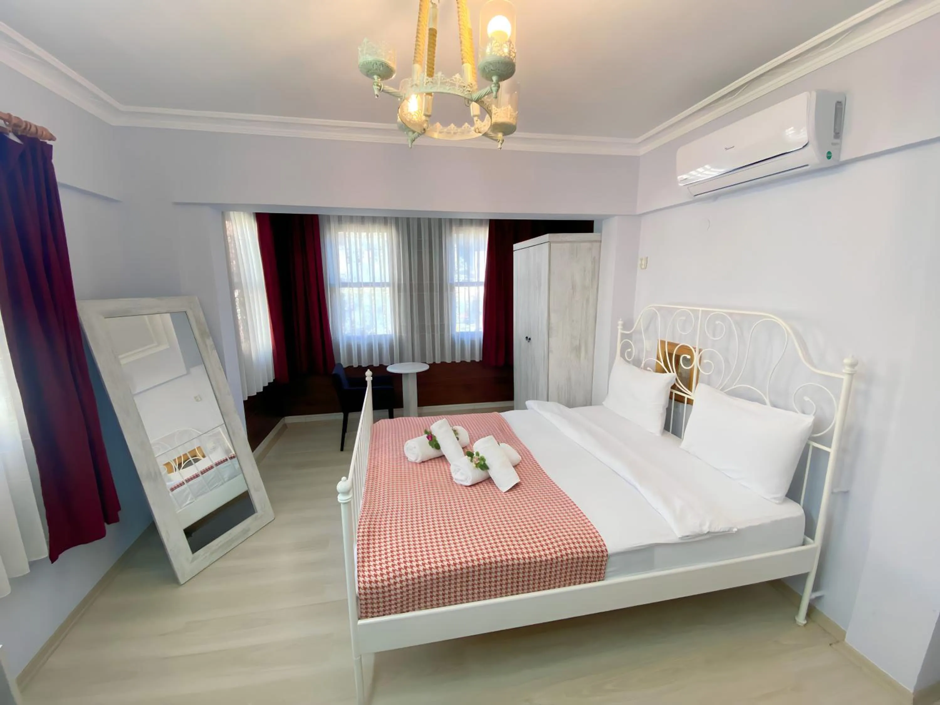 Bed in Queen Bee Hotel