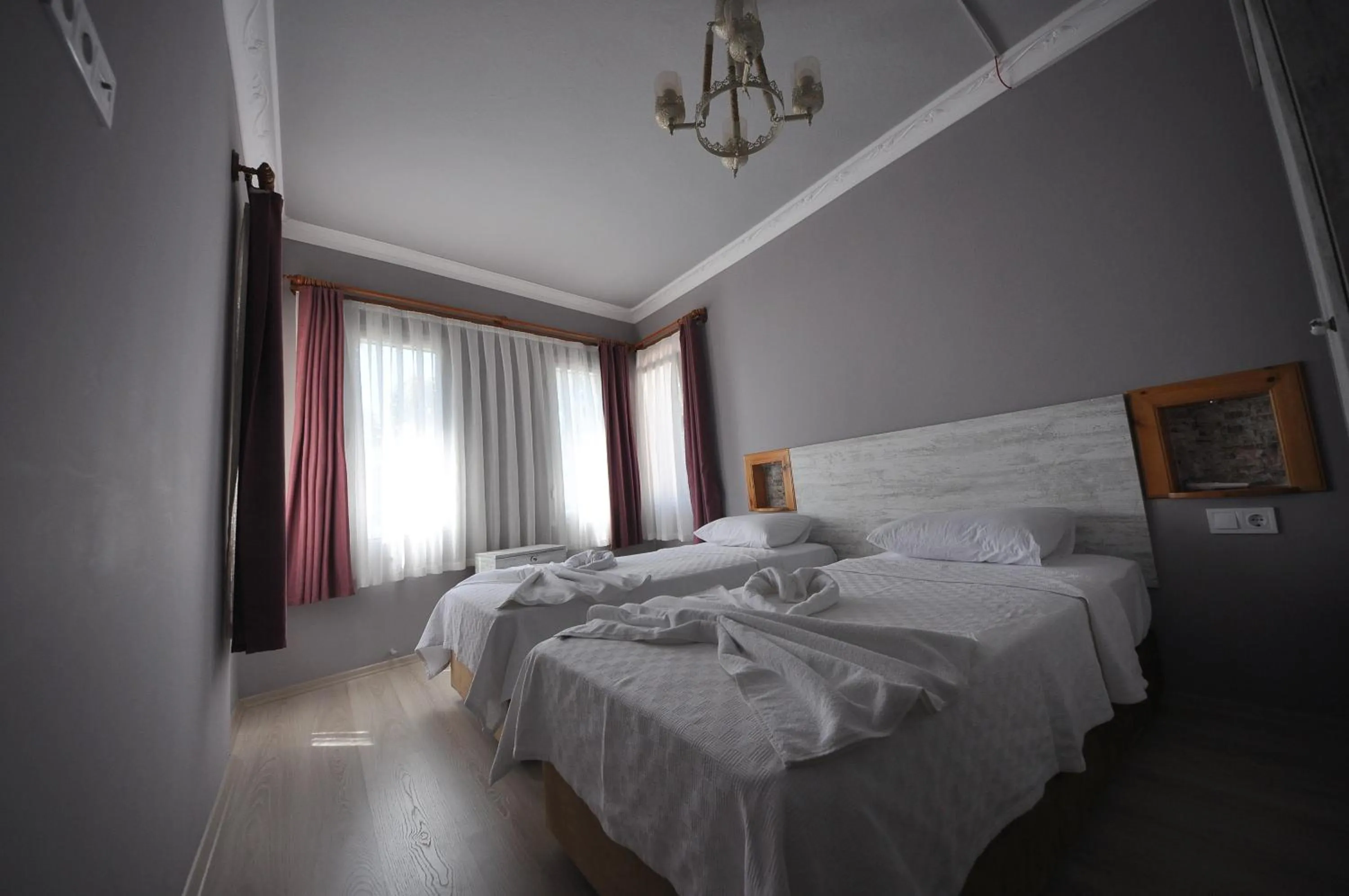 Bed in Queen Bee Hotel