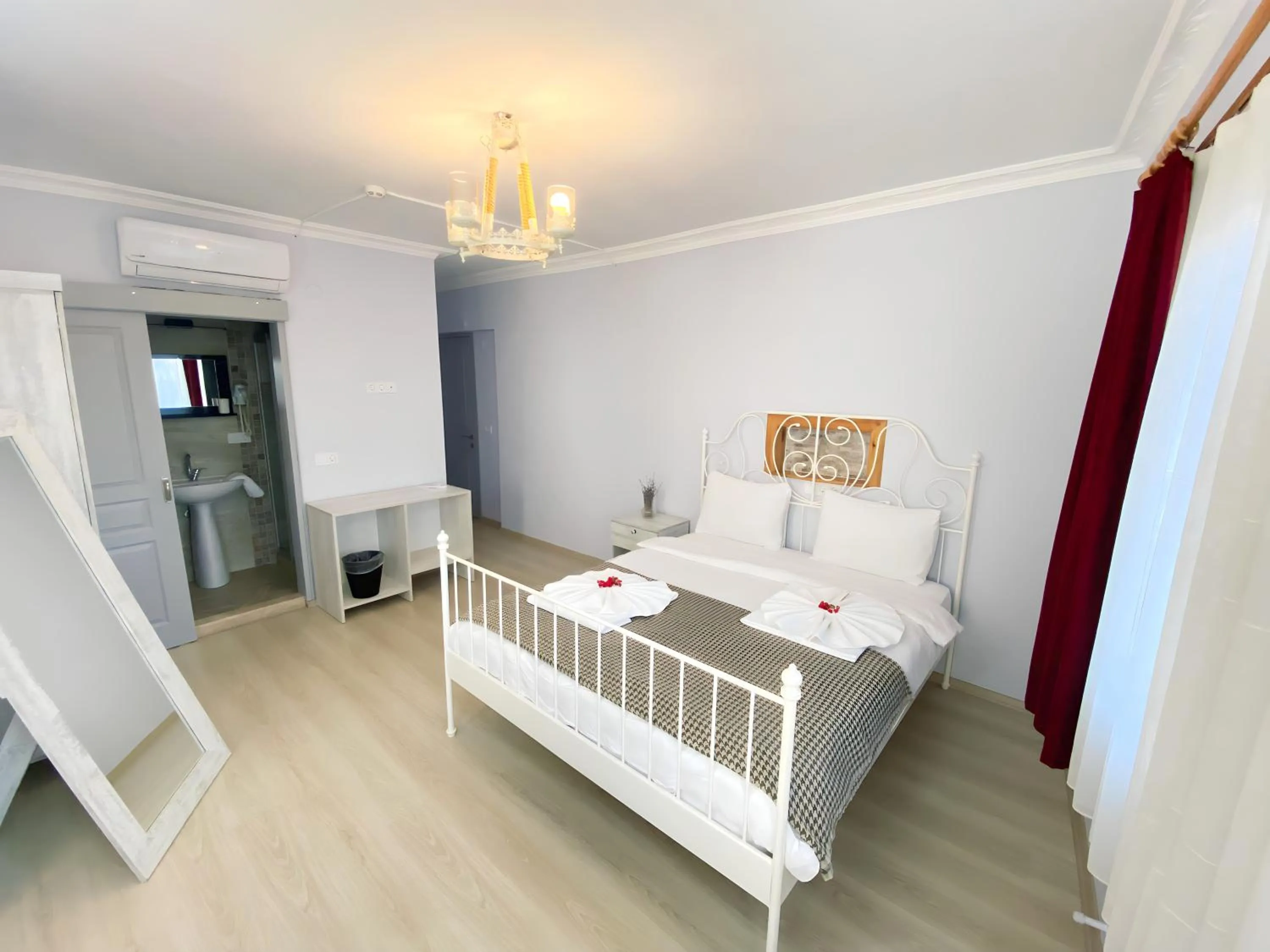 Bed in Queen Bee Hotel