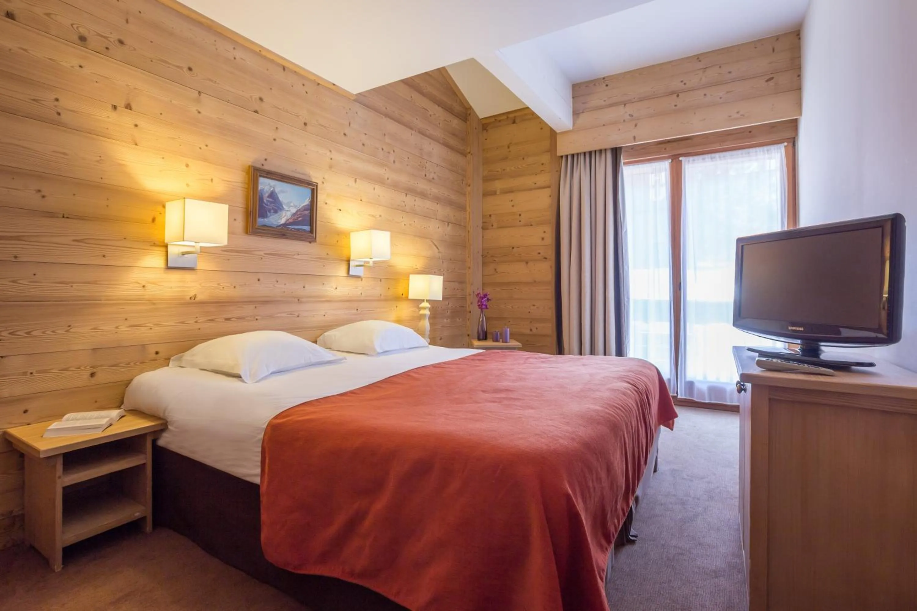 Communal lounge/ TV room, Bed in Résidence Pierre & Vacances Premium Les Chalets du Forum