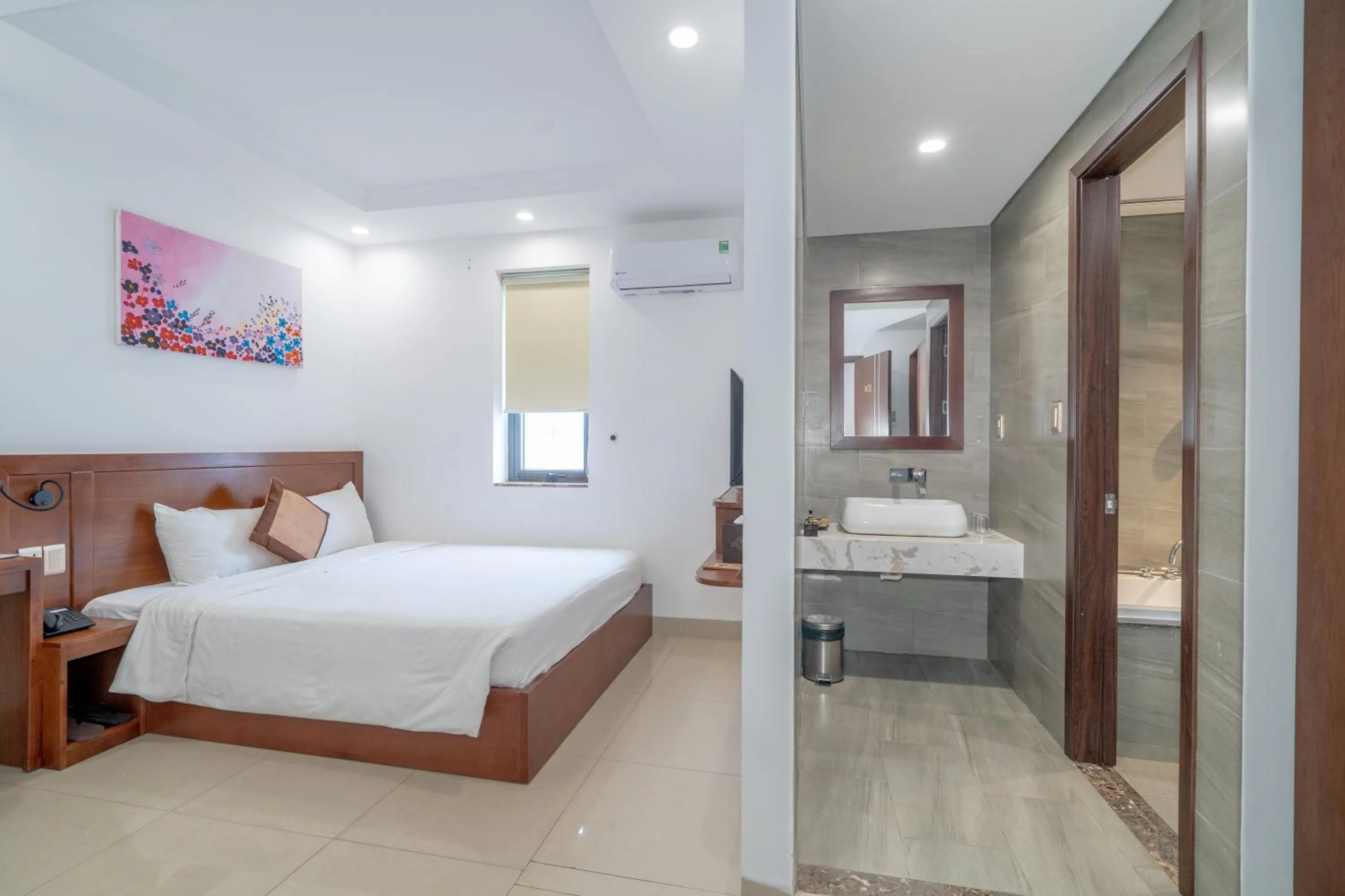 Bed in K Hotel Sauna and Massage