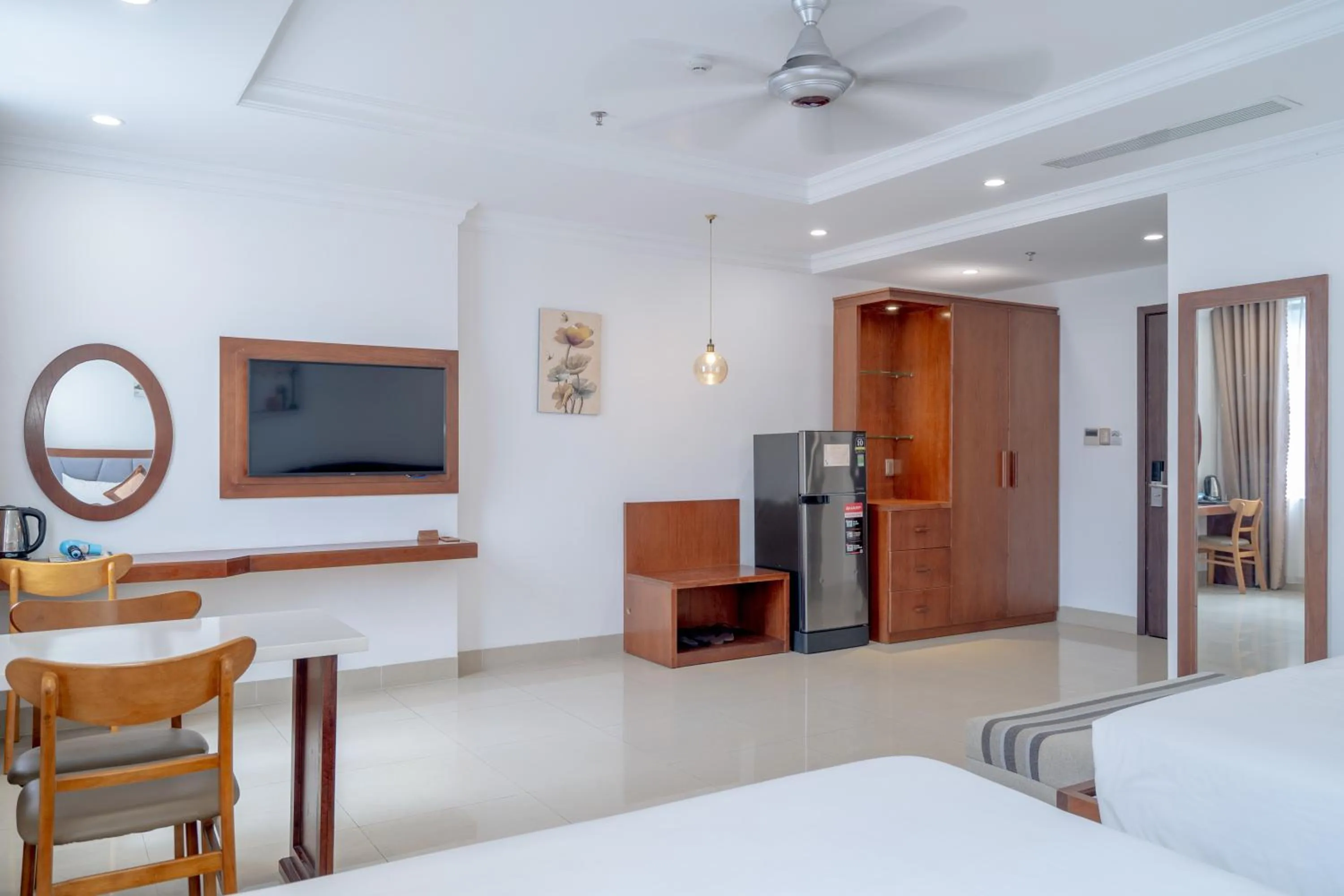 Bed in K Hotel Sauna and Massage