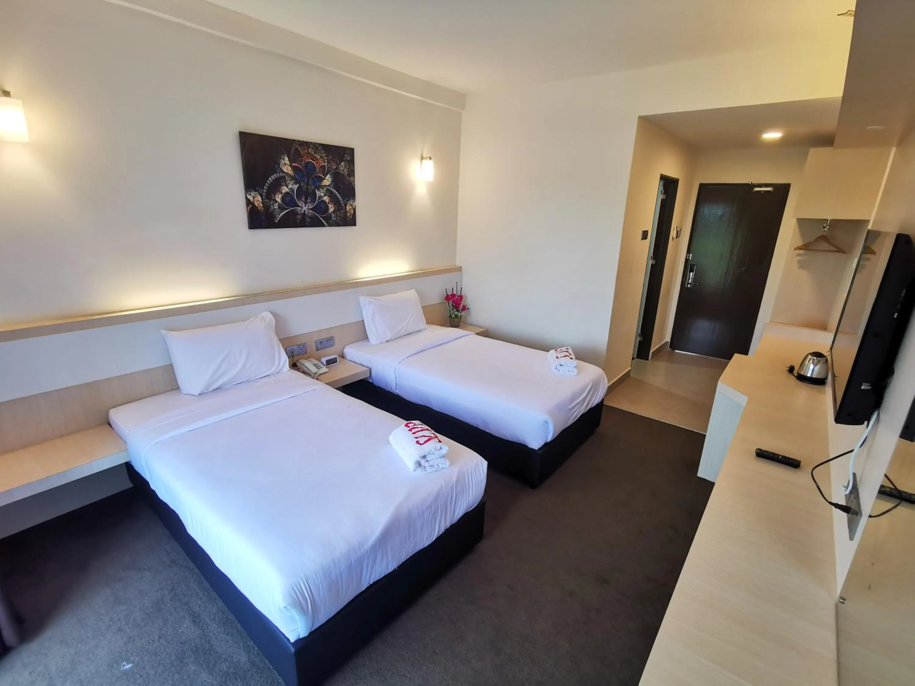 Bed in SERDANG LAKE VIEW RESORT