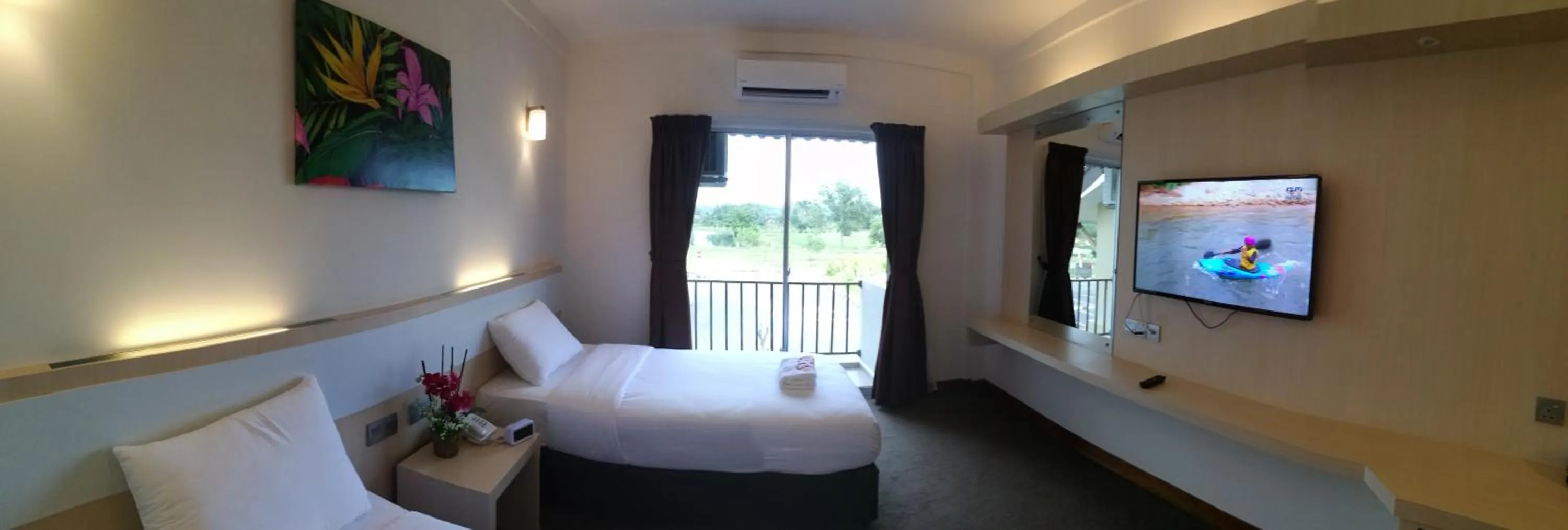 Bed in SERDANG LAKE VIEW RESORT