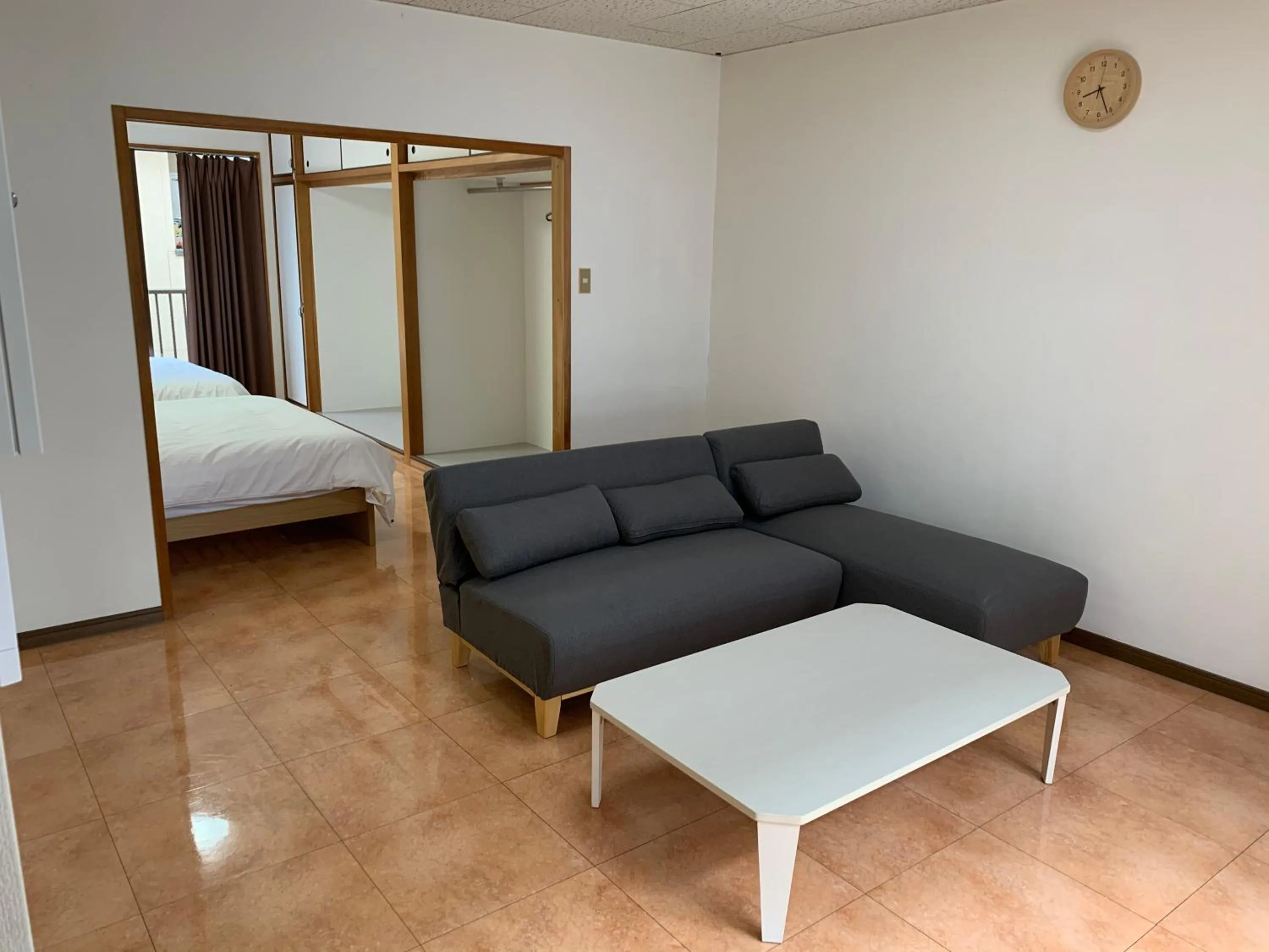 Living room, Bed in K's Hotel