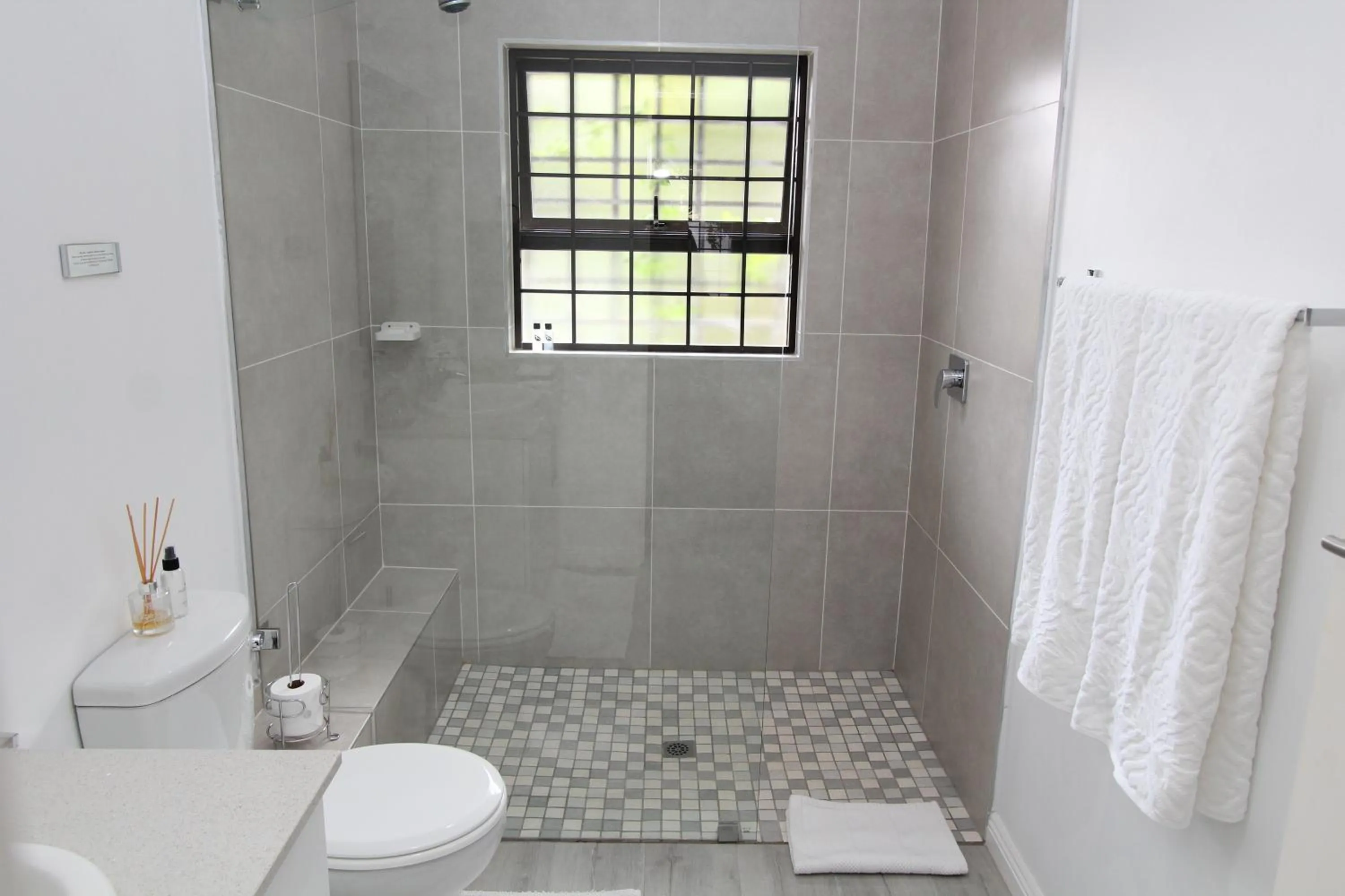 Bathroom in Beach Break B&B - Deluxe Suites