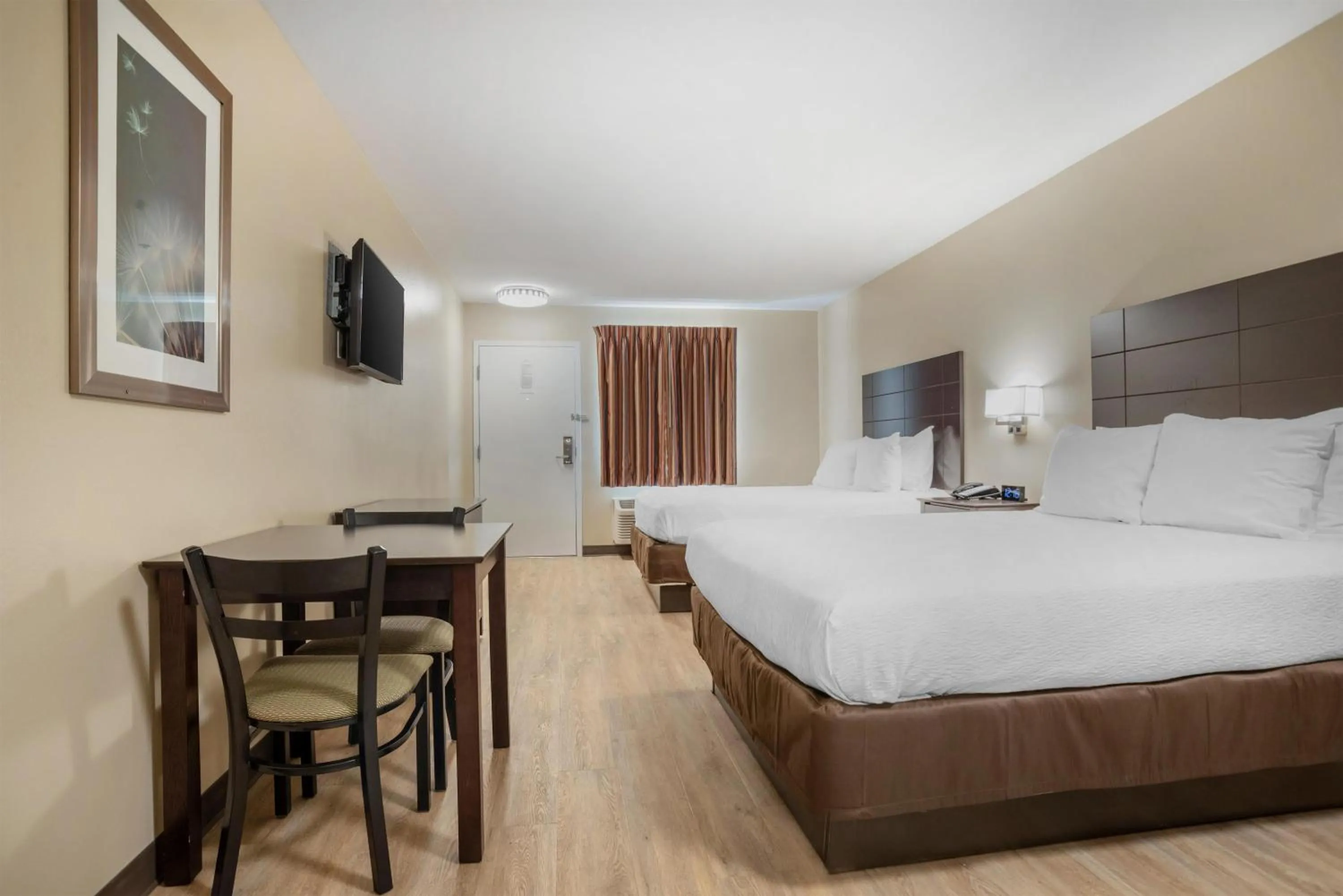 Bedroom in SureStay Studio by Best Western Gonzales