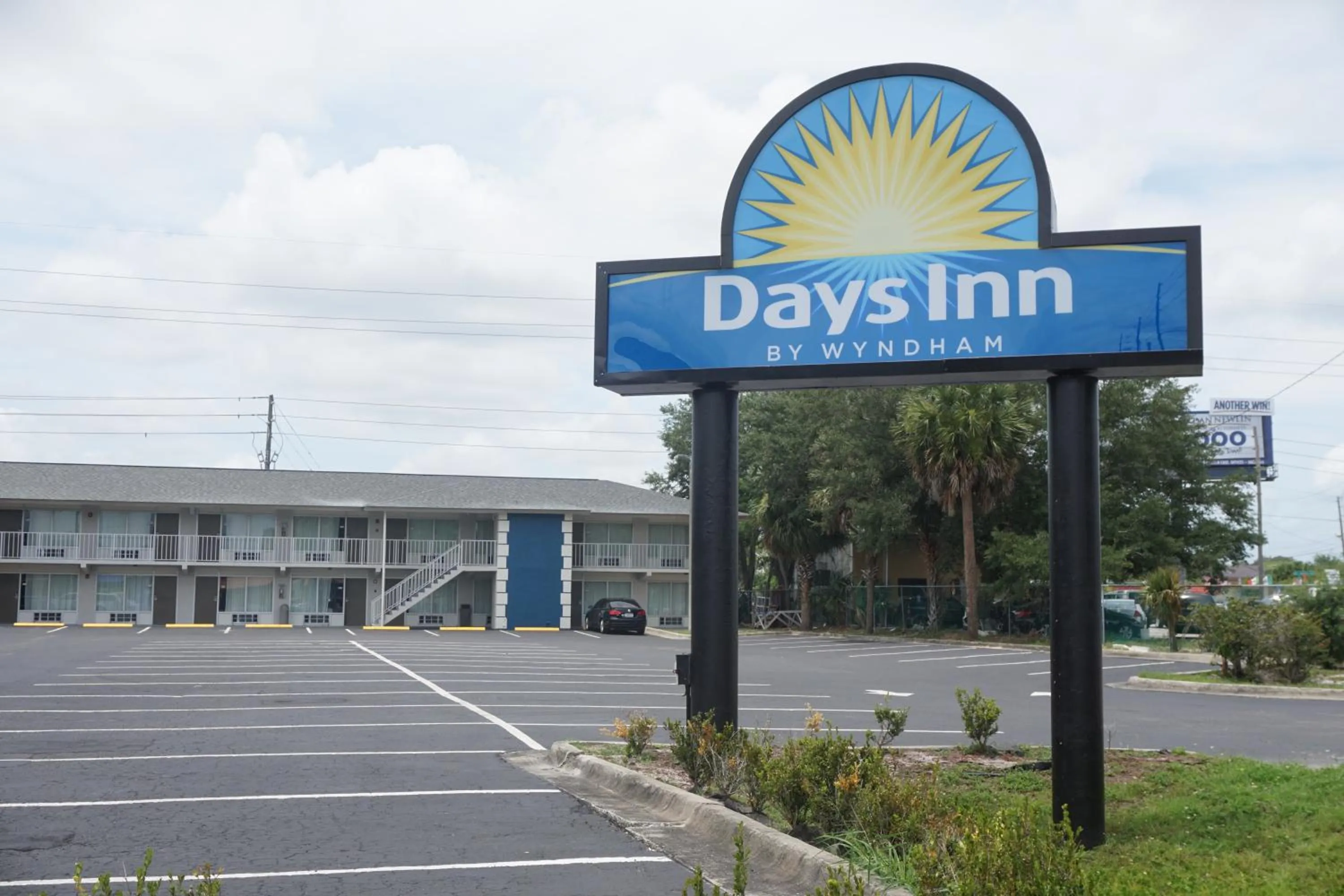 Property logo or sign in Days Inn by Wyndham Apopka/Orlando