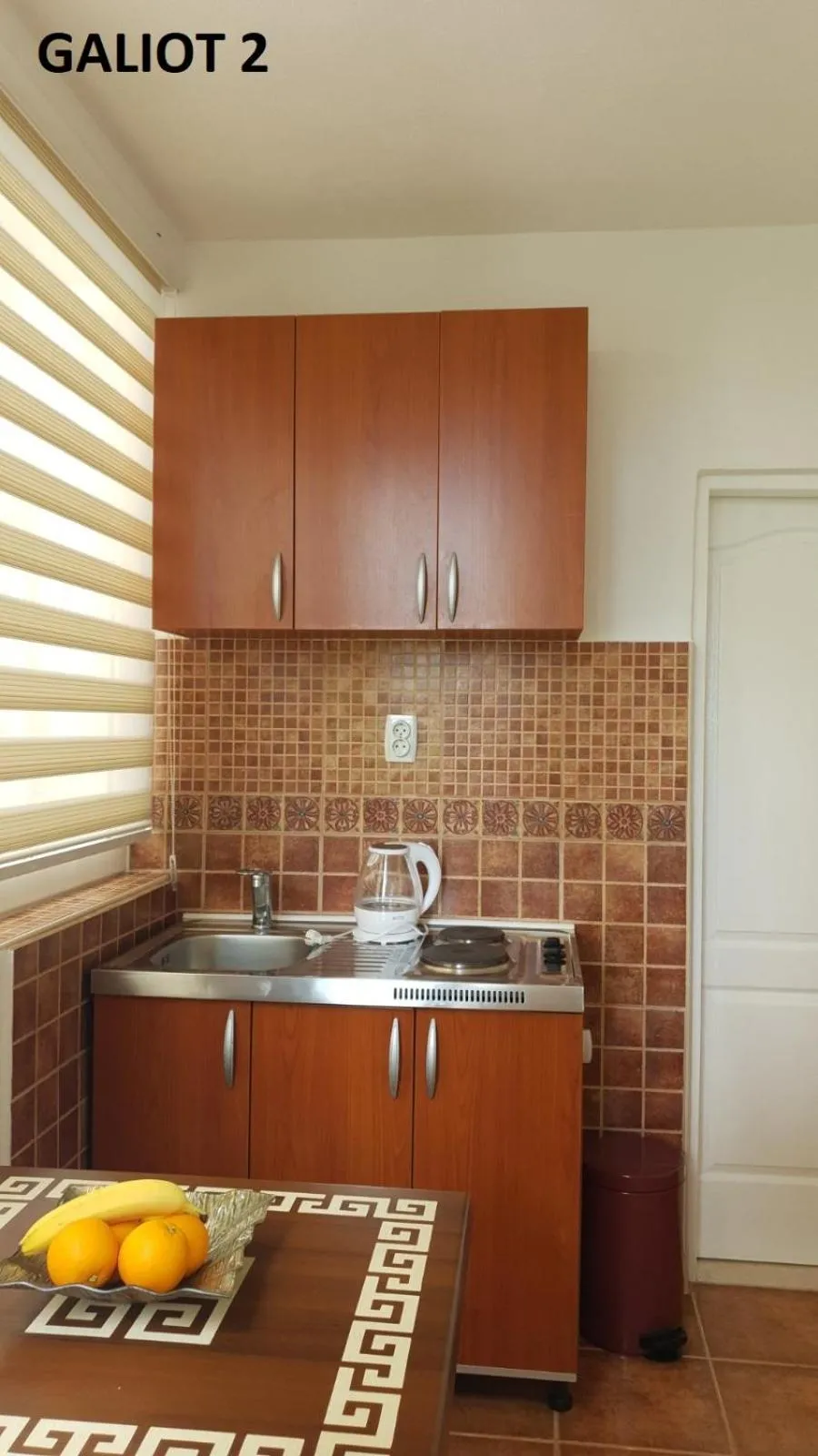 Kitchen or kitchenette in Apartmani Galiot