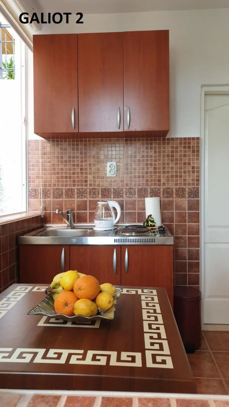 Kitchen or kitchenette in Apartmani Galiot