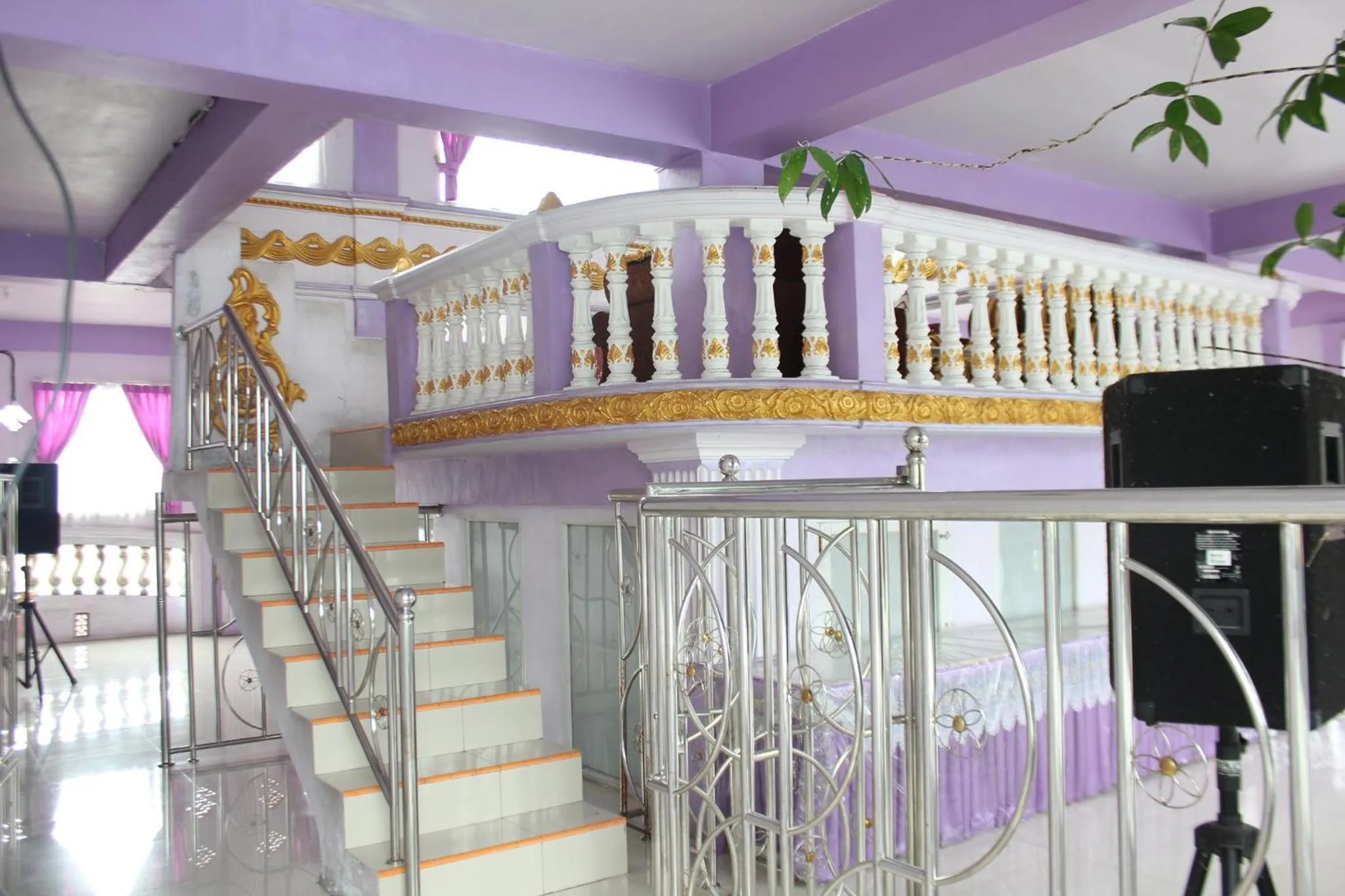 Communal lounge/ TV room in Trivadoh Syariah Hotel