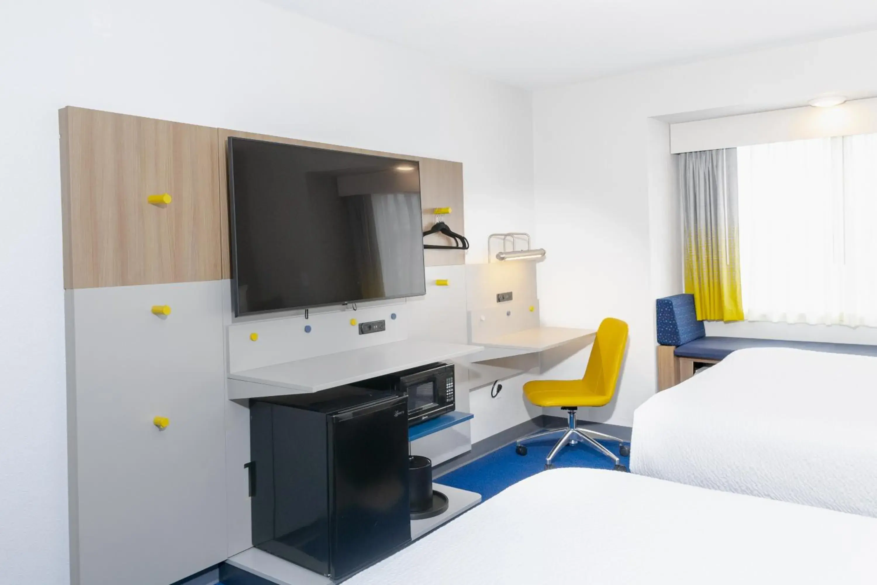 TV and multimedia, Bed in Microtel Inn & Suites by Wyndham Wellsville TV and multimedia, Bed in Microtel Inn & Suites by Wyndham Wellsville