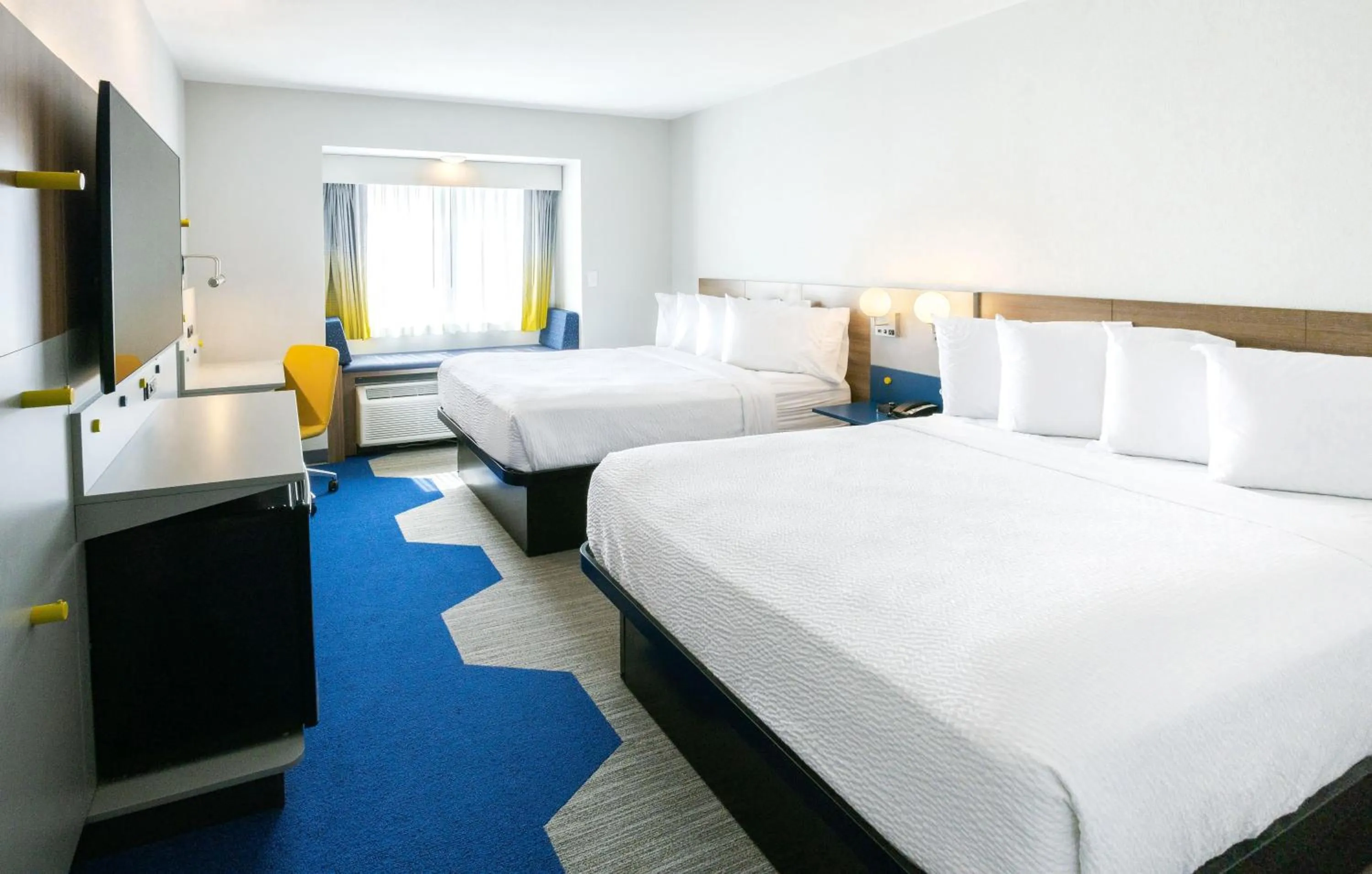 Photo of the whole room, Bed in Microtel Inn & Suites by Wyndham Wellsville