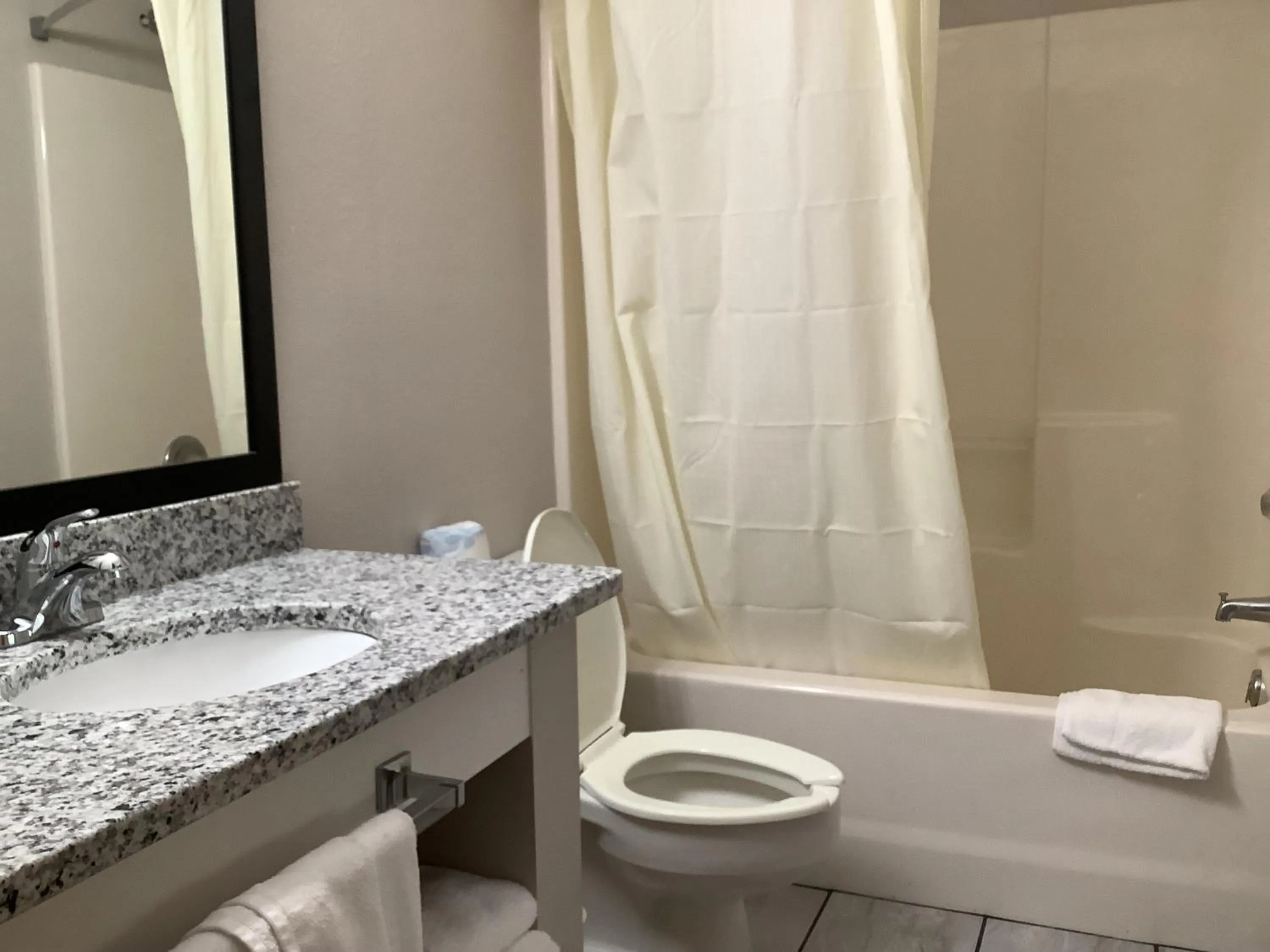 Bathroom in Days Inn by Wyndham Kingdom City