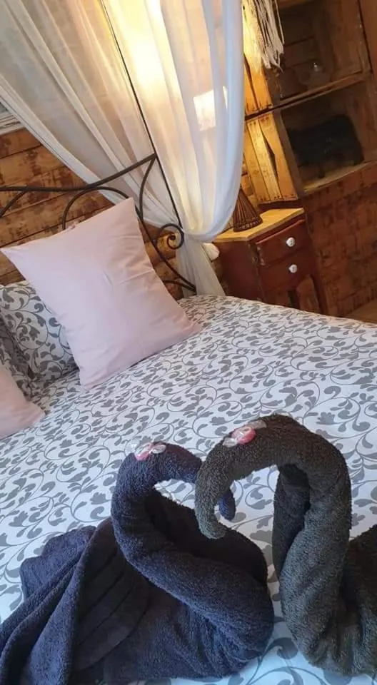 Bed in Chambre d'hôtes Le Petit Ranch