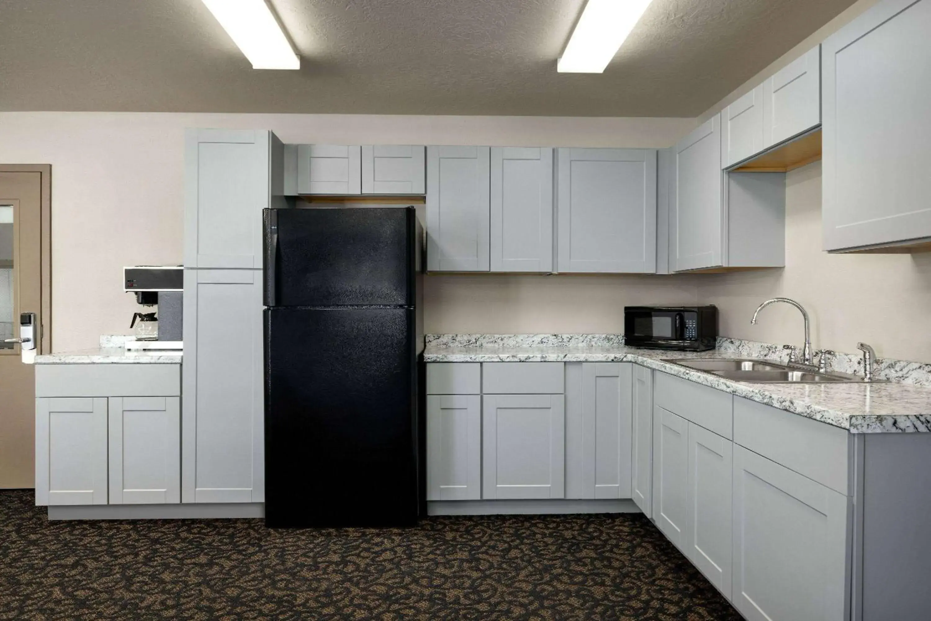 Lobby or reception in Travelodge by Wyndham Vaughn Lobby or reception in Travelodge by Wyndham Vaughn