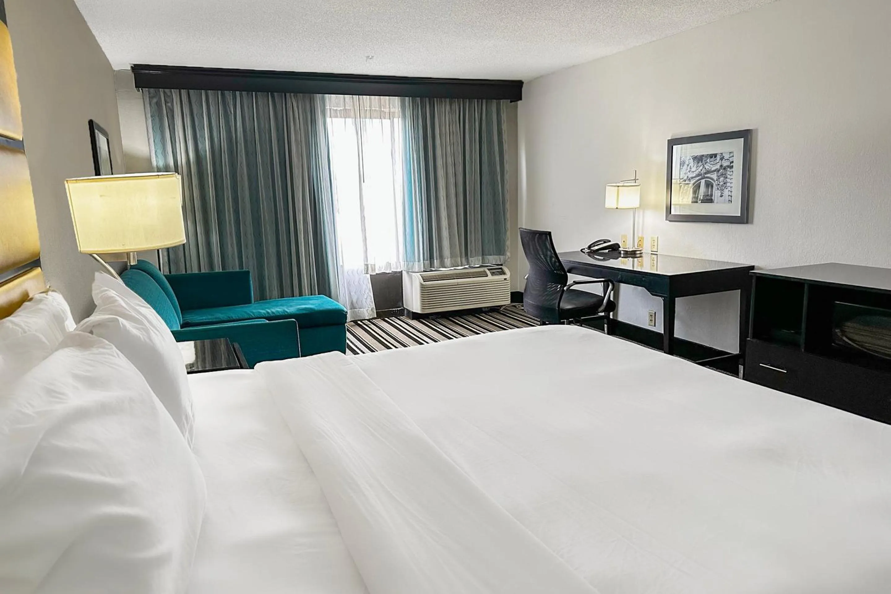 Bedroom, Bed in OYO Townhouse Jackson - Ridgeland