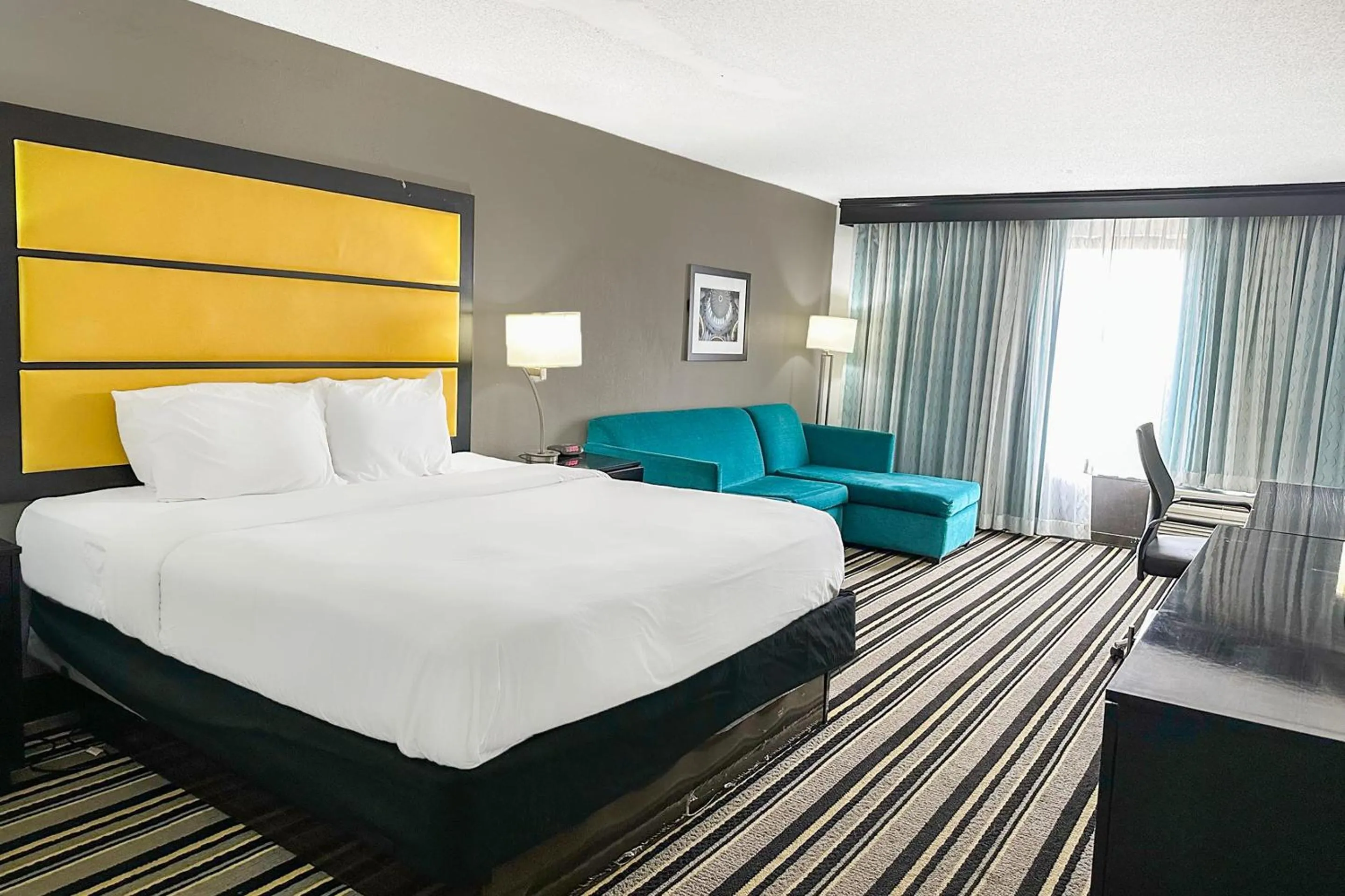 Bedroom, Bed in OYO Townhouse Jackson - Ridgeland