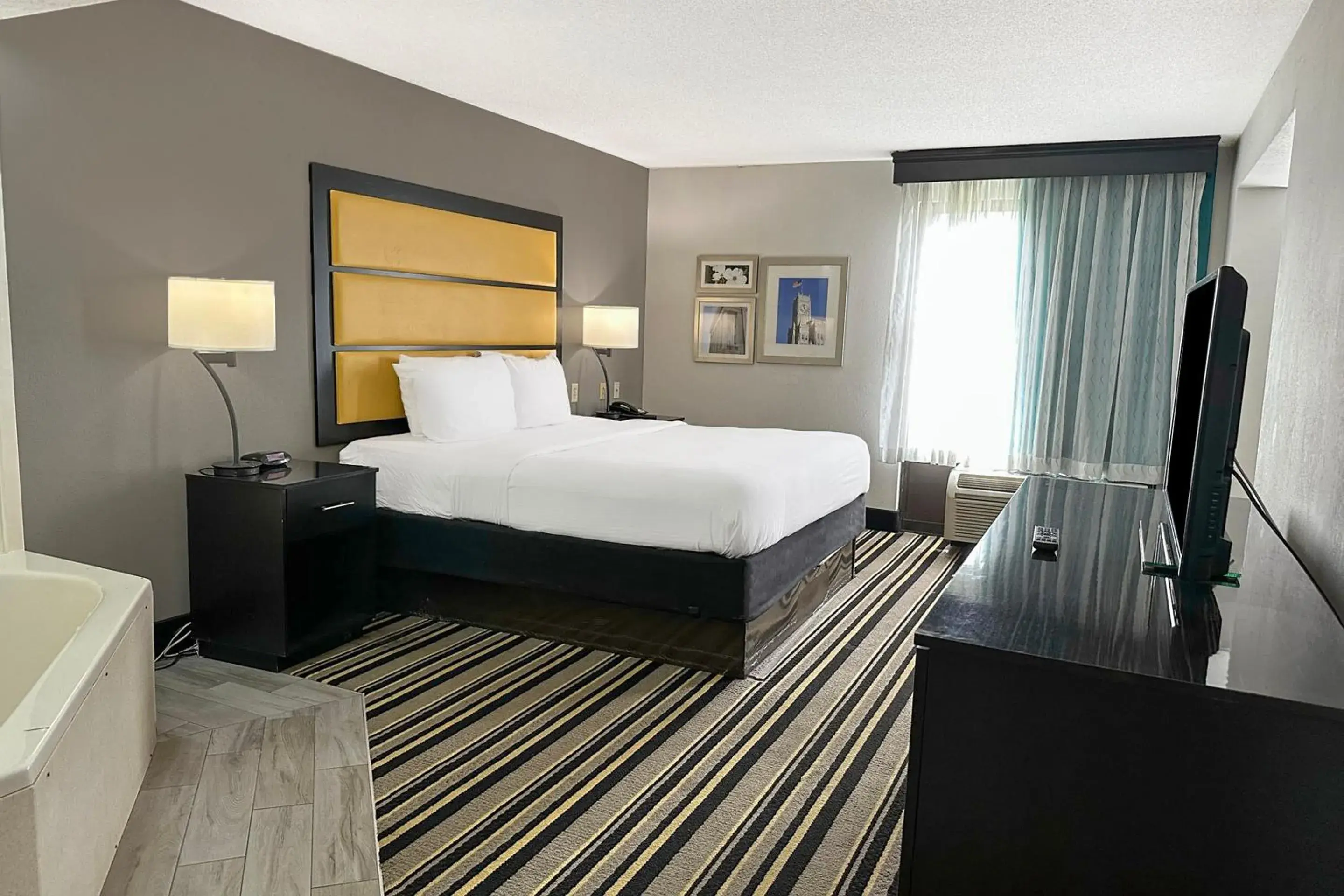 Bedroom, Bed in OYO Townhouse Jackson - Ridgeland Bedroom, Bed in OYO Townhouse Jackson - Ridgeland