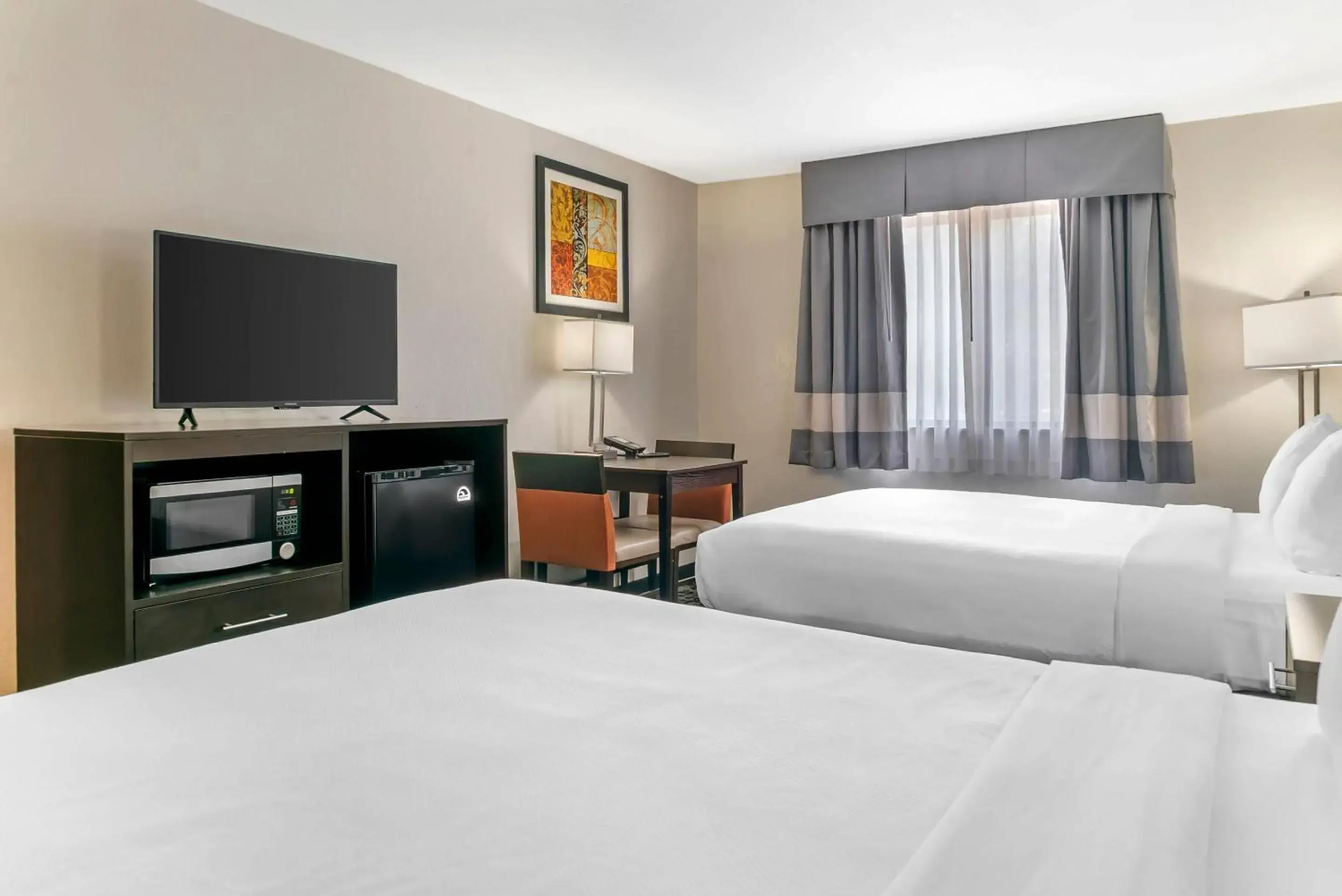 Bedroom, Bed in Quality Inn Grand Rapids South-Byron Center Bedroom, Bed in Quality Inn Grand Rapids South-Byron Center