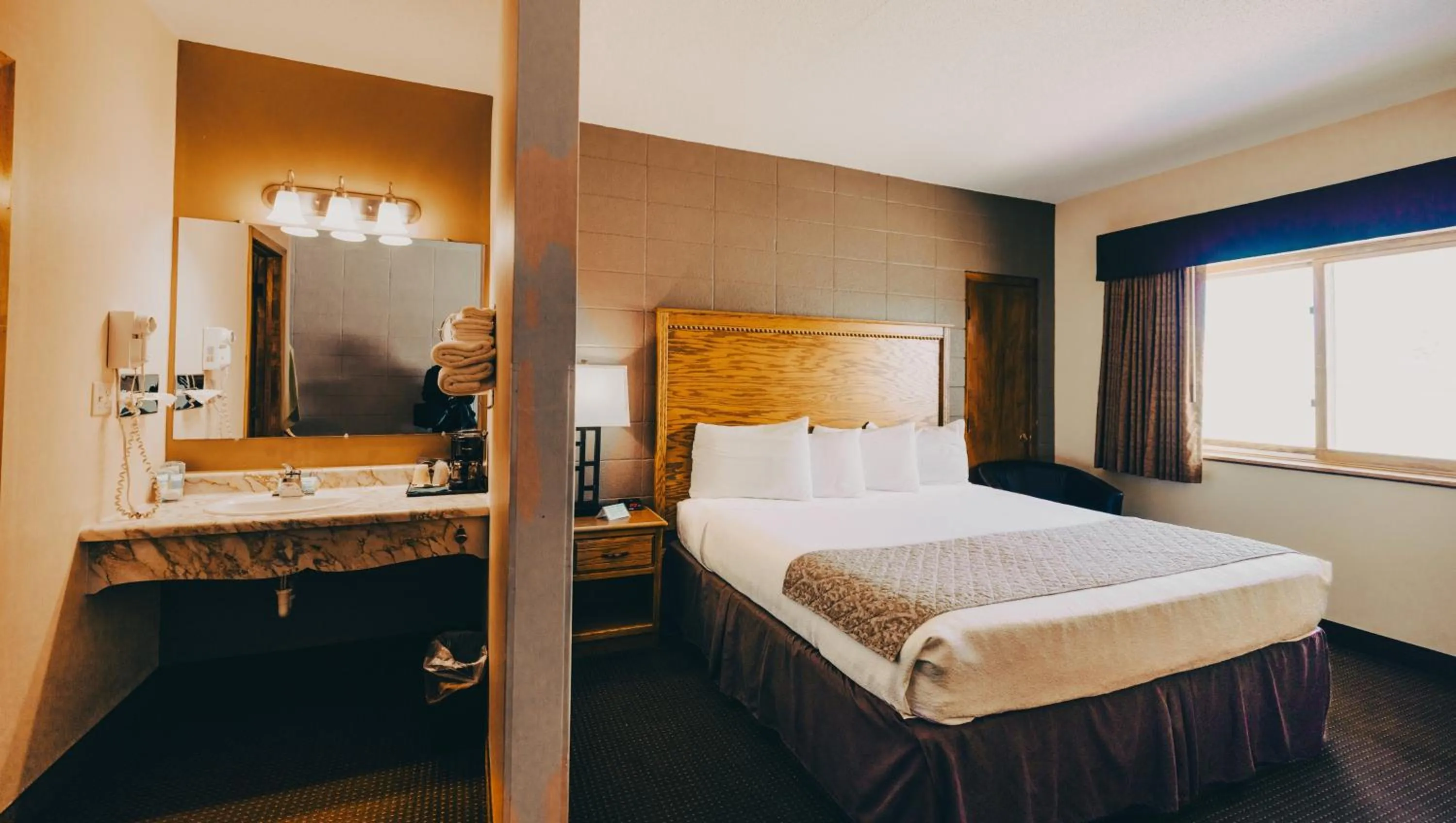 Bedroom in Wrangler Inn Mobridge