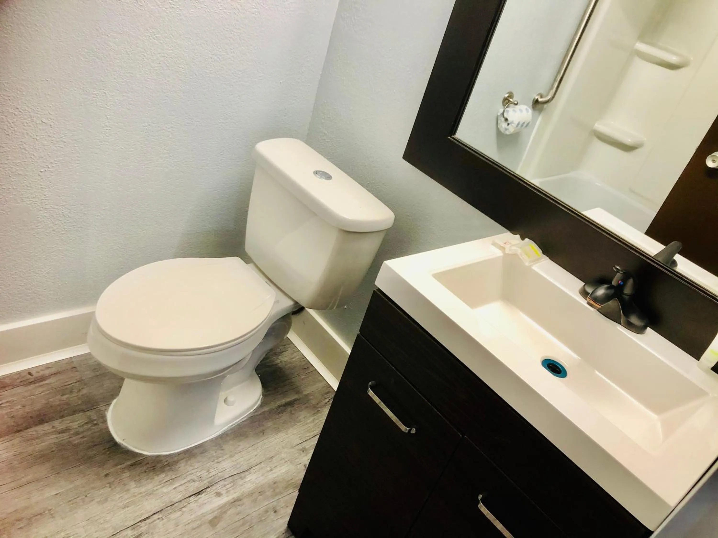 Bathroom in Montgomery Inn & Suites