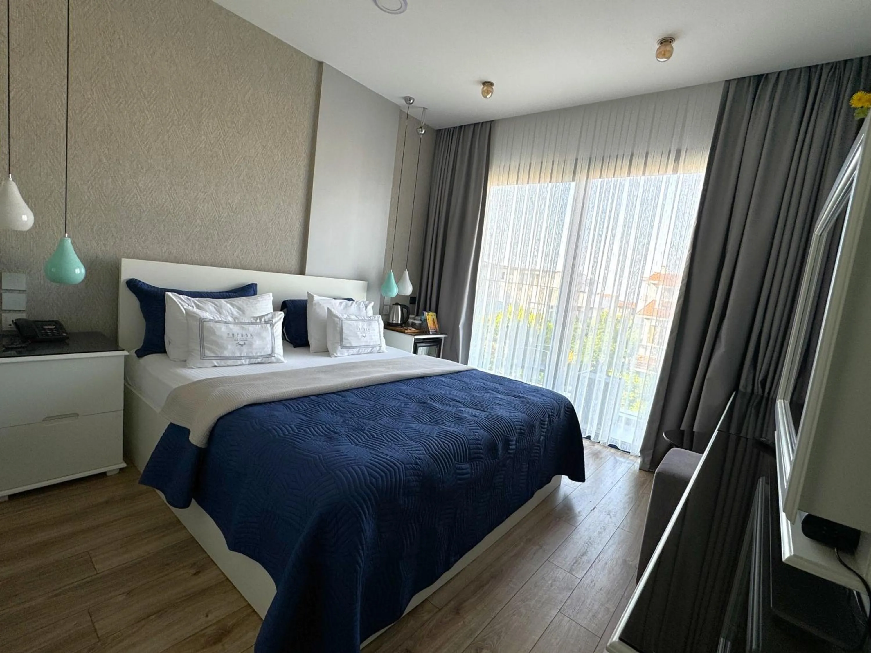 Bed in Ferush Boutique Hotel