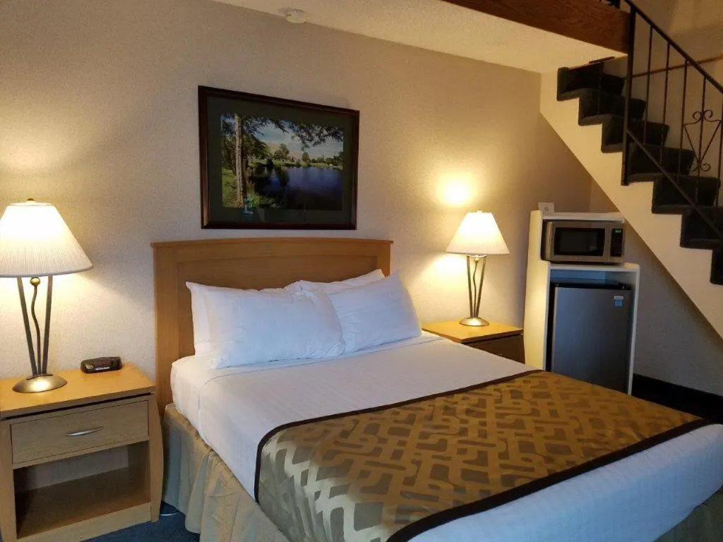 Bed in RiverTree Inn & Suites