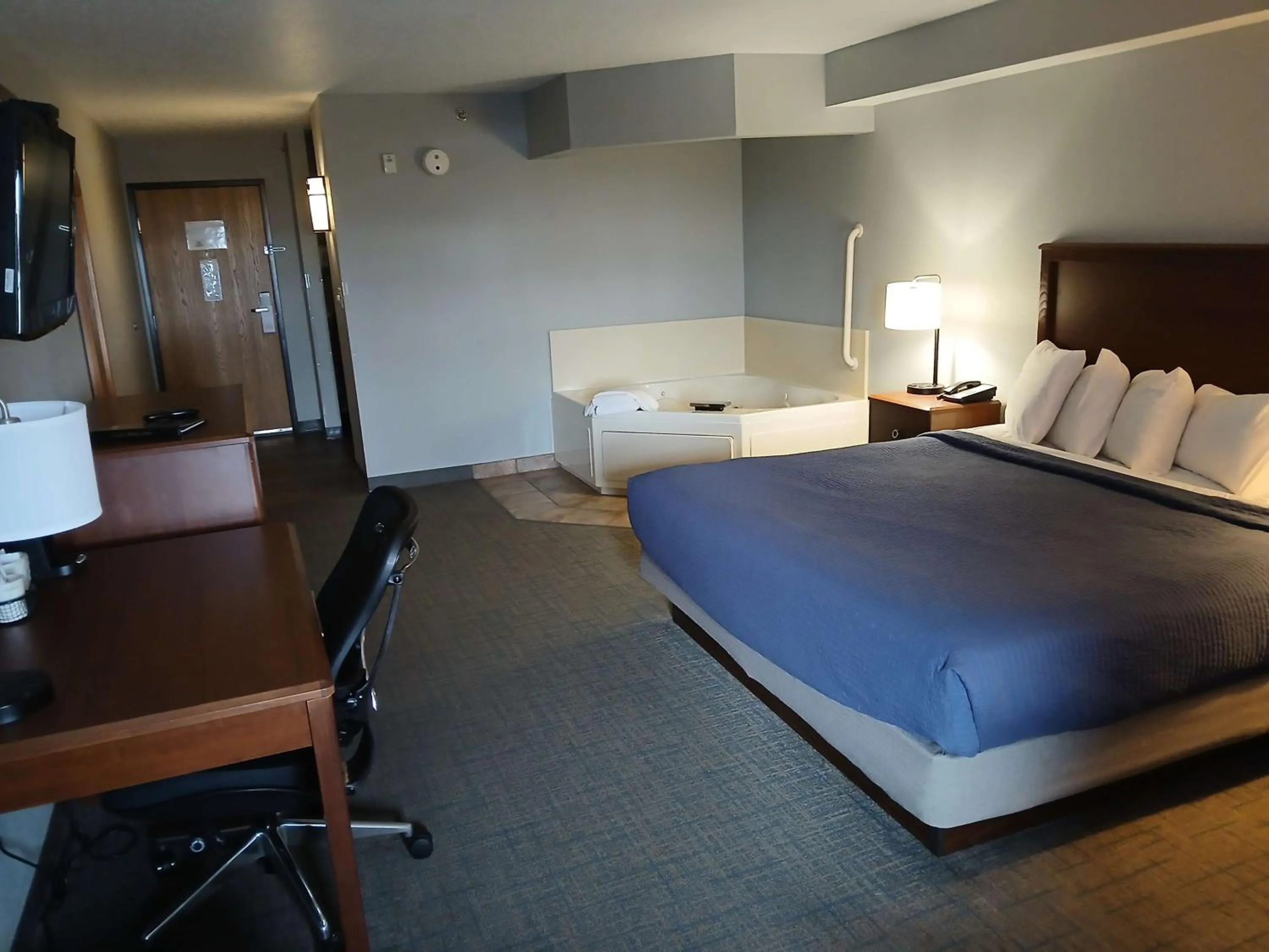 Bedroom, Bed in Black Beach Inn by GrandStay