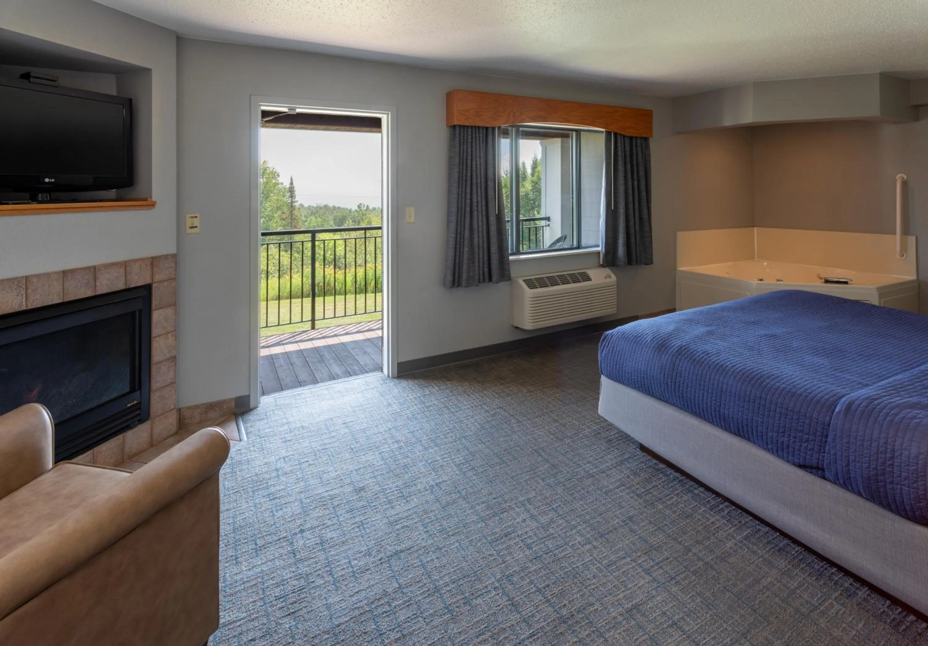 Bed in Black Beach Inn by GrandStay