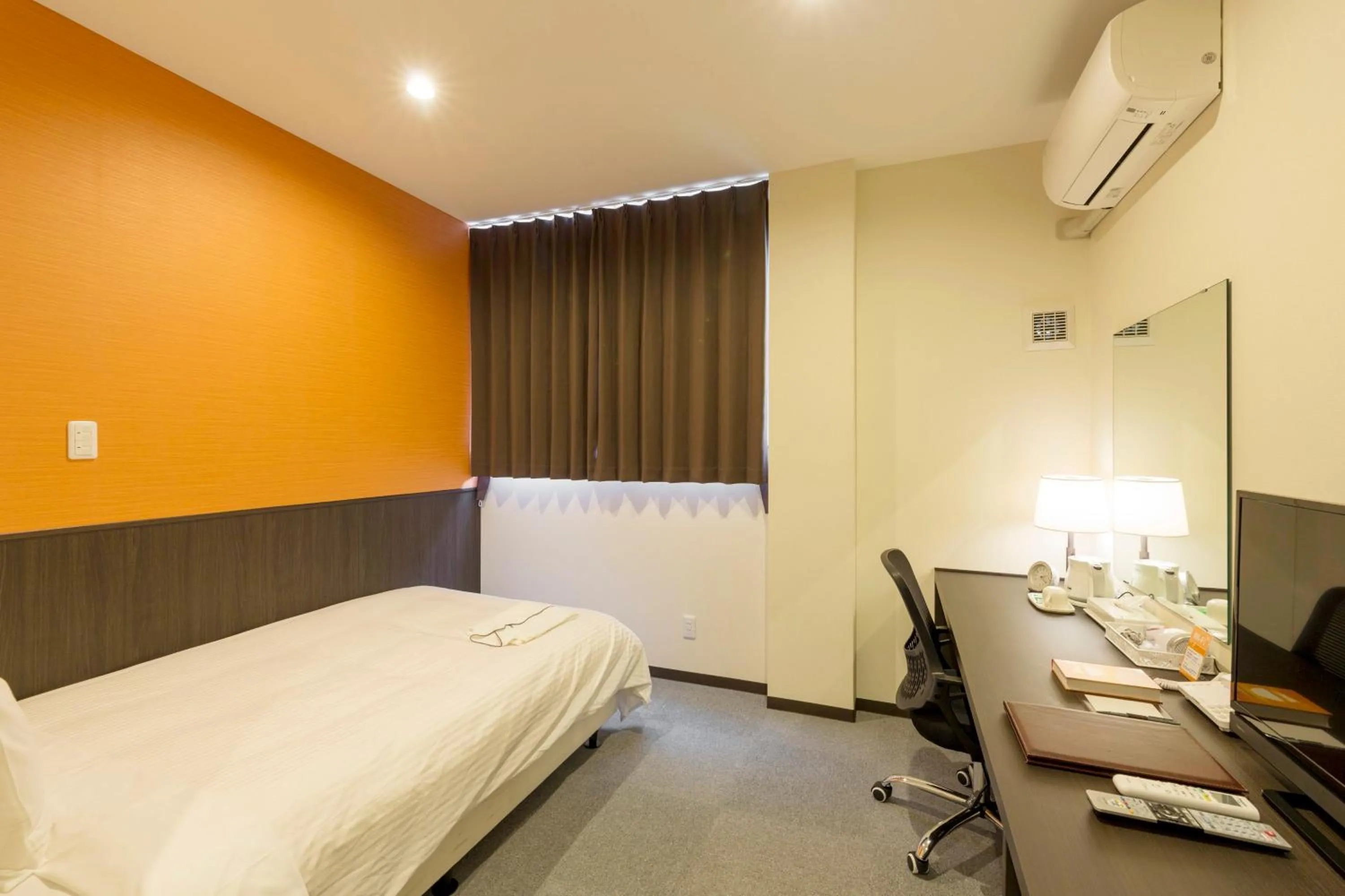 Photo of the whole room, Bed in Crown Hotel Okinawa Annex