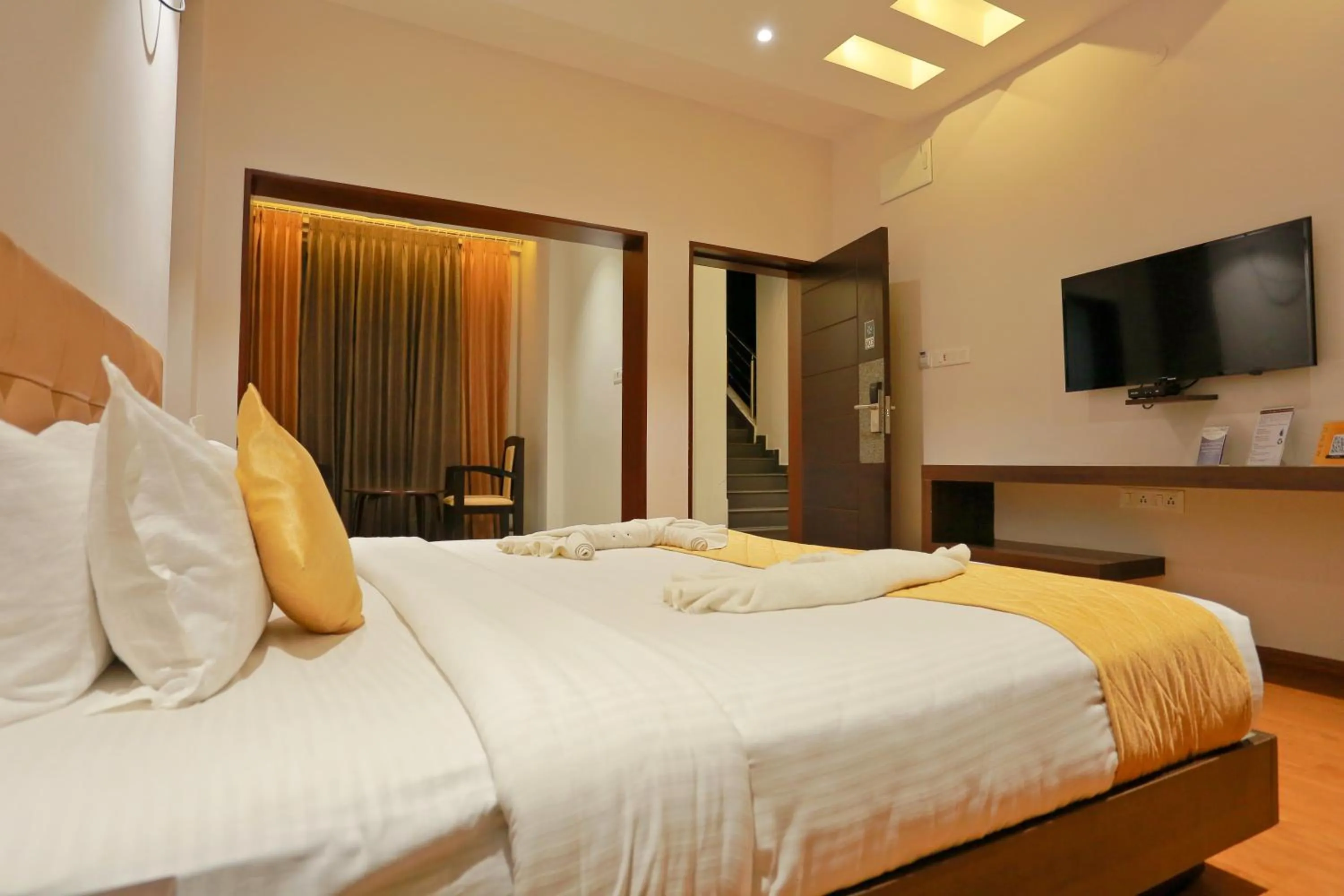 Bed in Grand Signature Hotel & spa